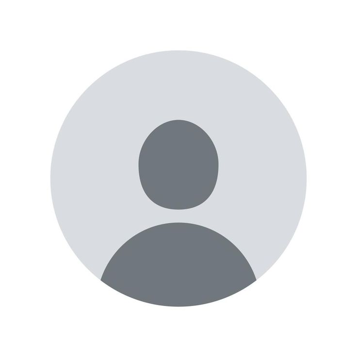 smiling woman wearing white and black pinstriped collared top