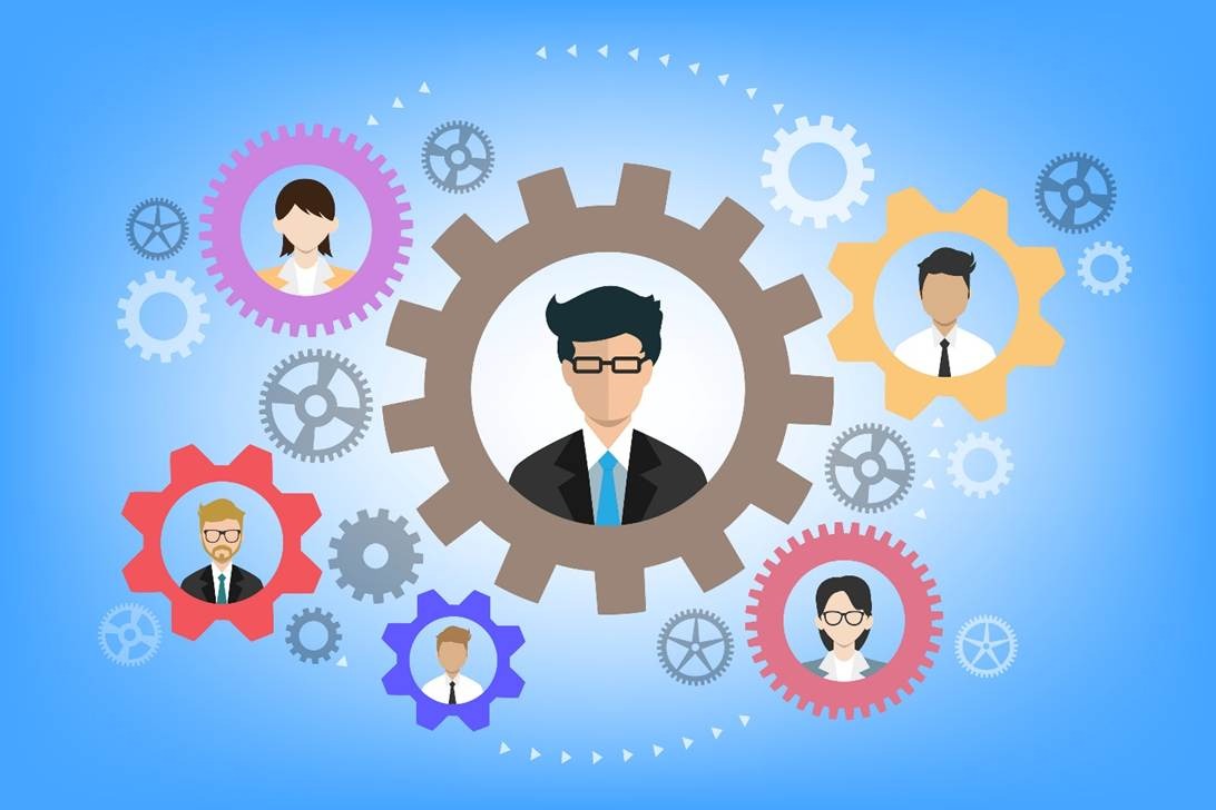 Illustration of five avatar profiles in colorful interlocking gears representing creator network management