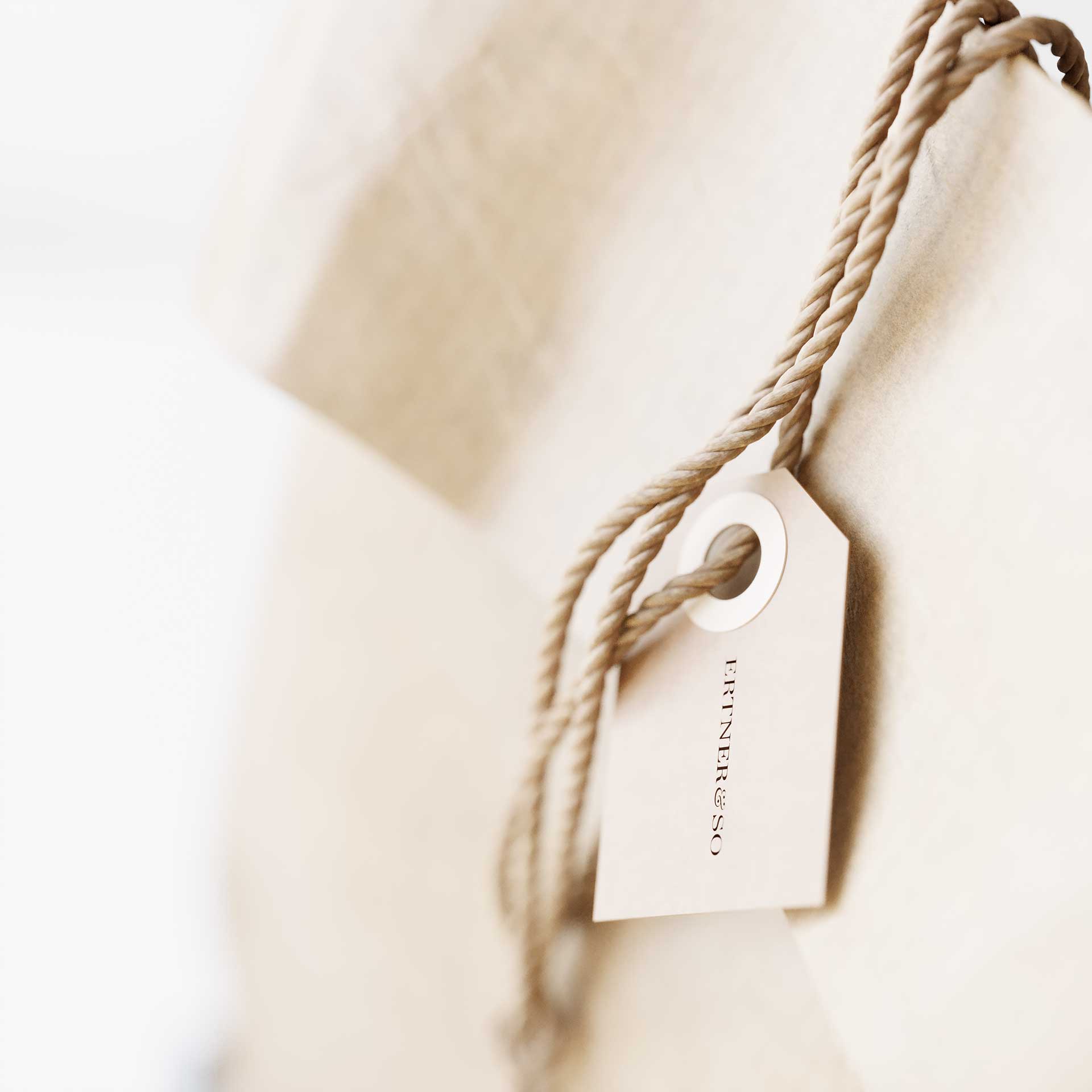 a pile of magazines sitting on top of a bed