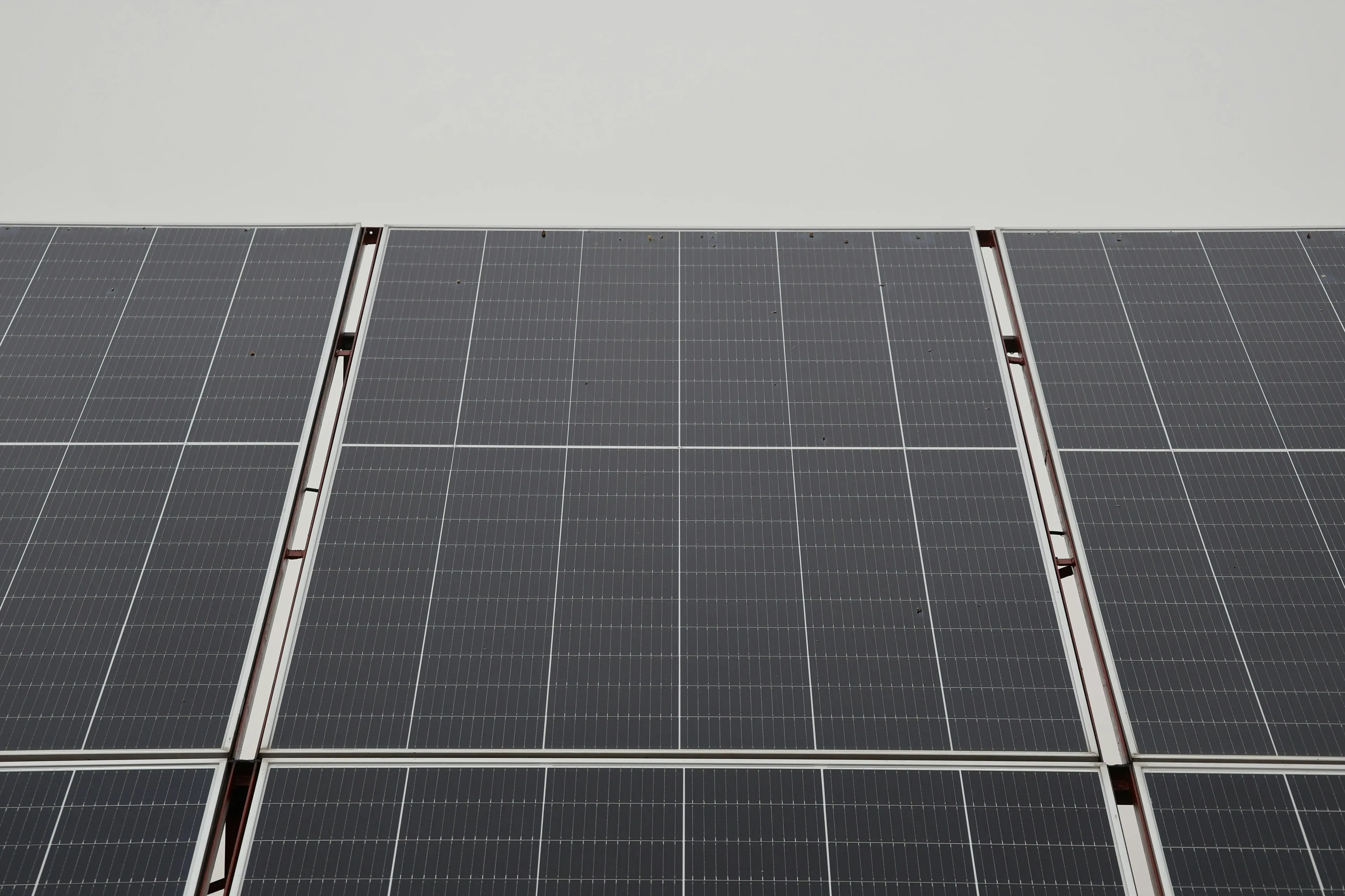 Rooftop solar panels converting sunlight into renewable electricity