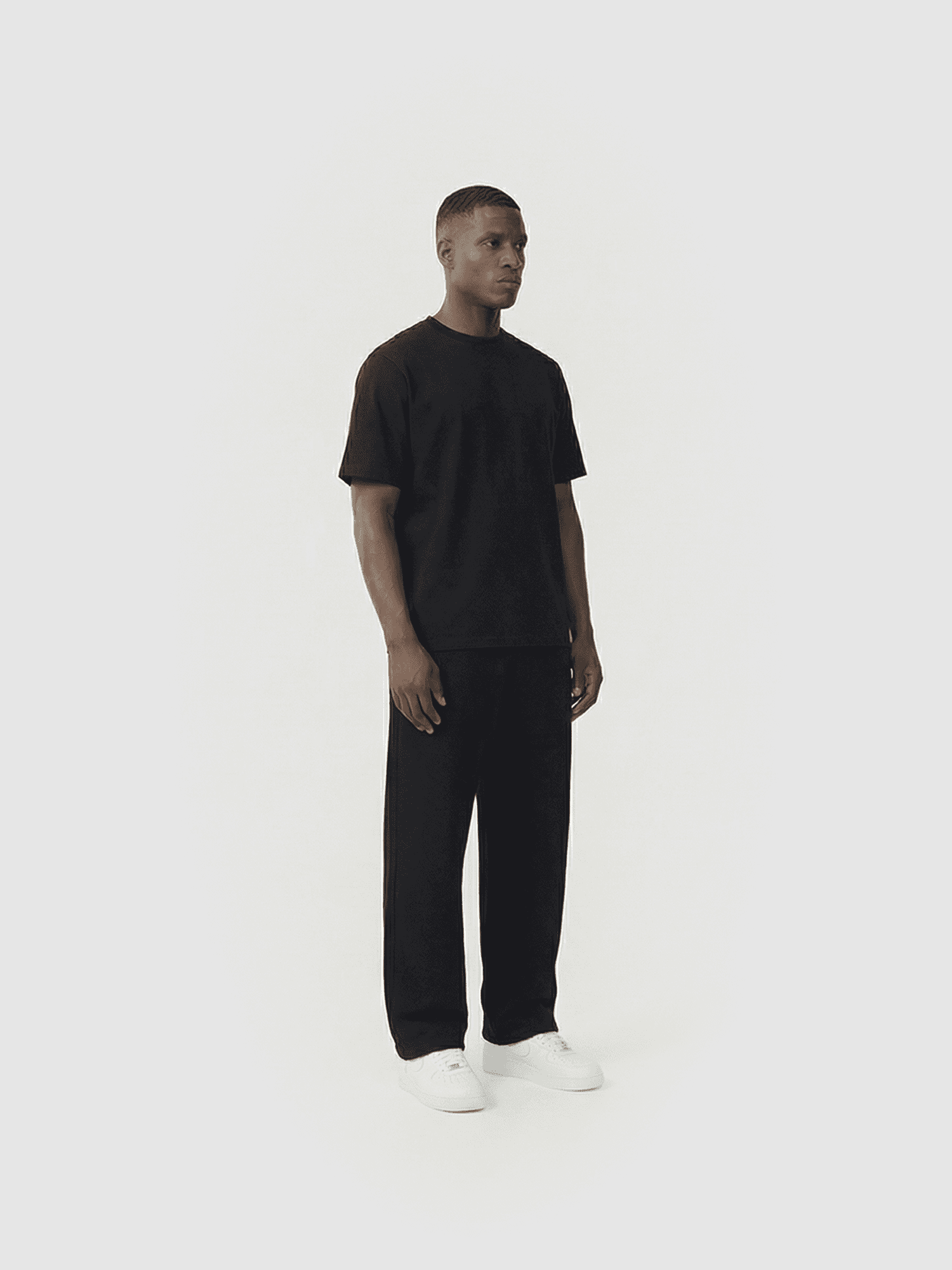 Heavyweight classic crew T-shirt in navy — front view on model.