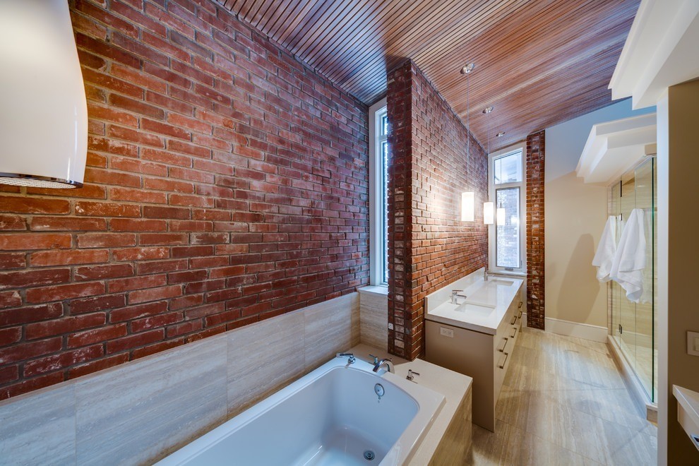 Image of Luxury bathroom with freestanding tub, double vanity, and spa-like shower designed by KHD Homes.