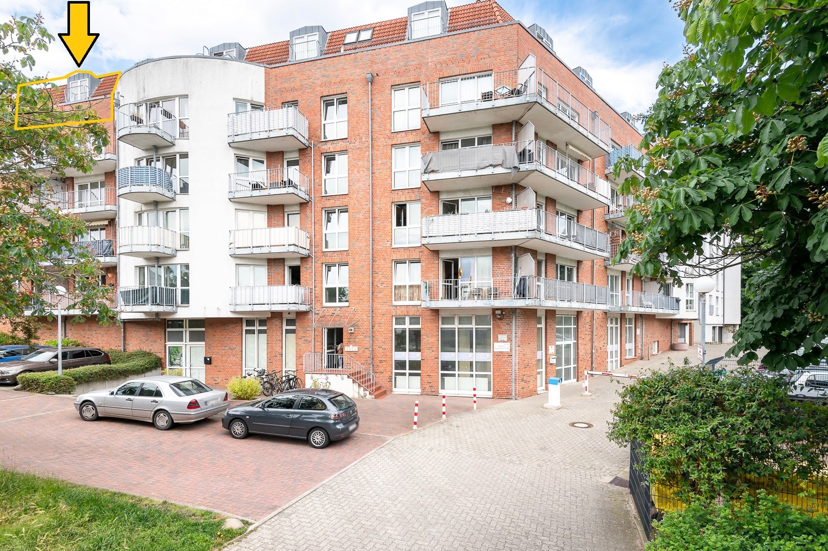 Einfamilienhaus mit Vorgarten in Kiel mit roter Ziegelsteinwand