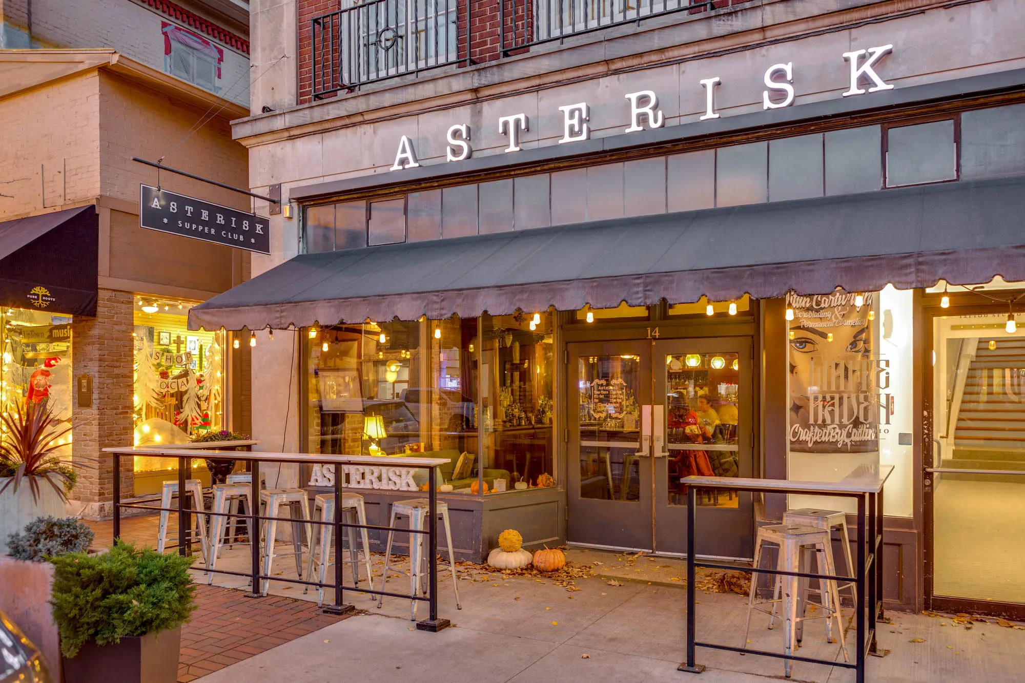 Asterisk Supper Club storefront and covered patio on State Street