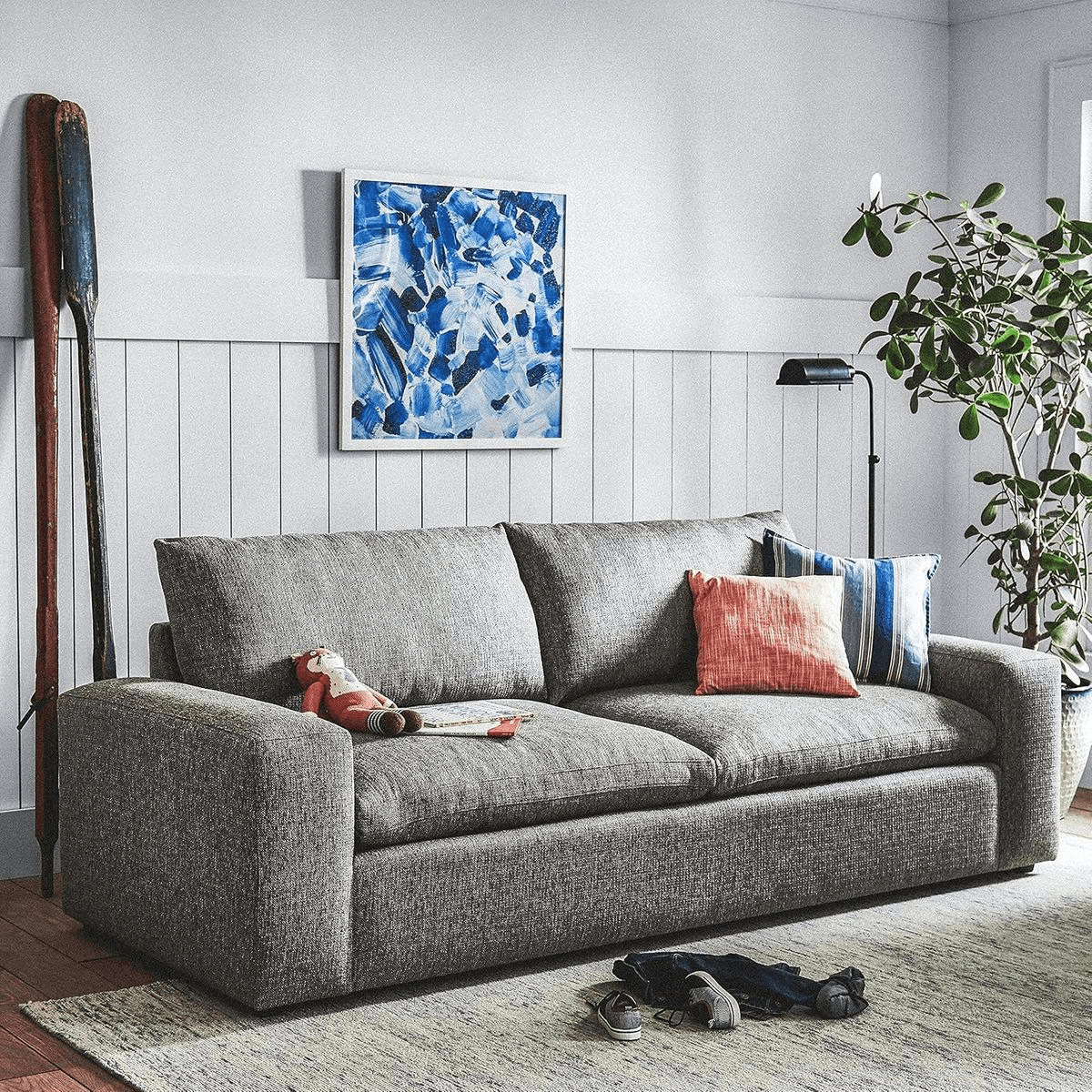 Stone & Beam Hoffman gray down-filled performance sectional sofa with pillows in a cozy living room