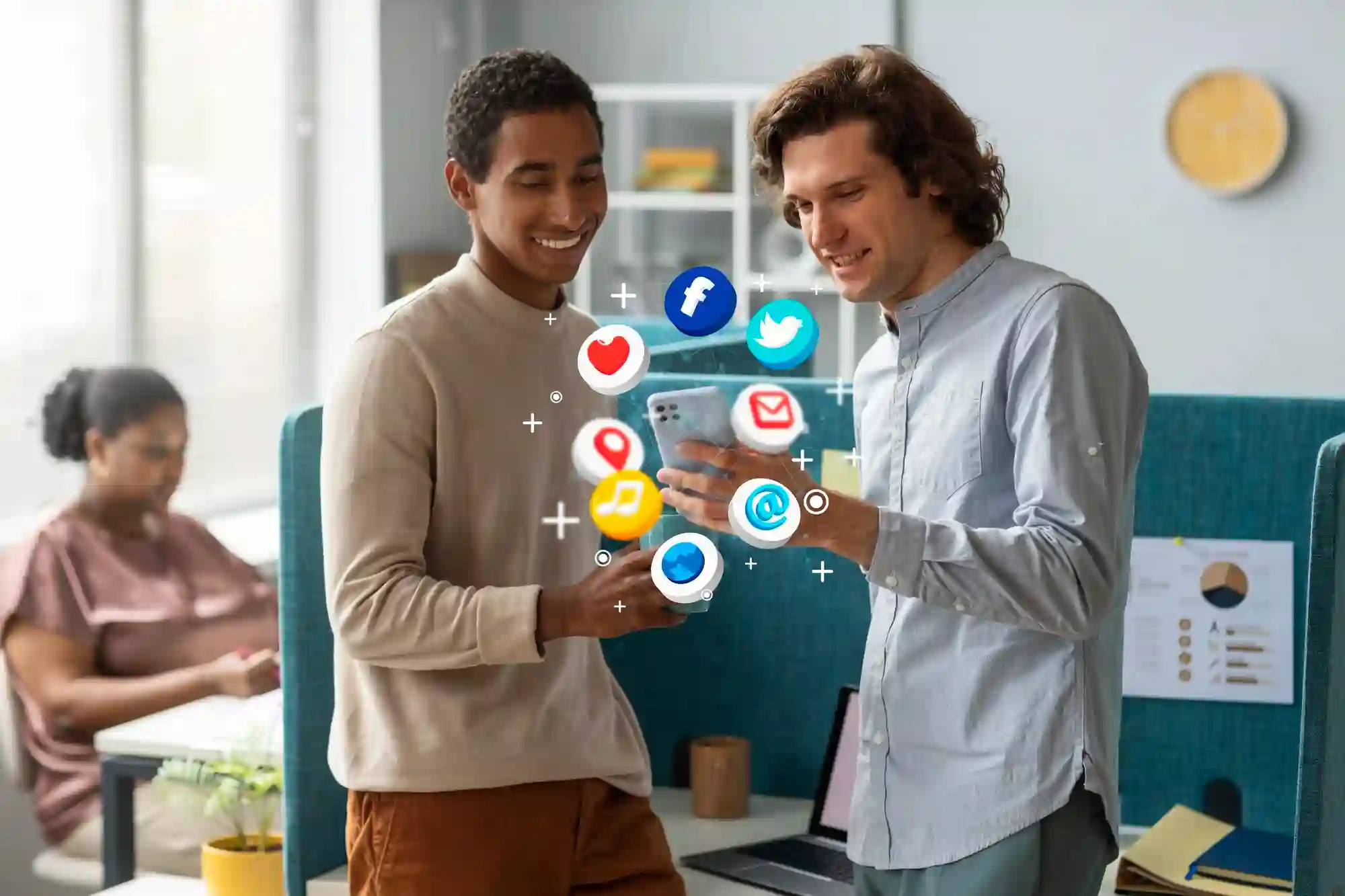 Two colleagues viewing a smartphone with floating social media icons, highlighting collaborative digital marketing and online engagement.