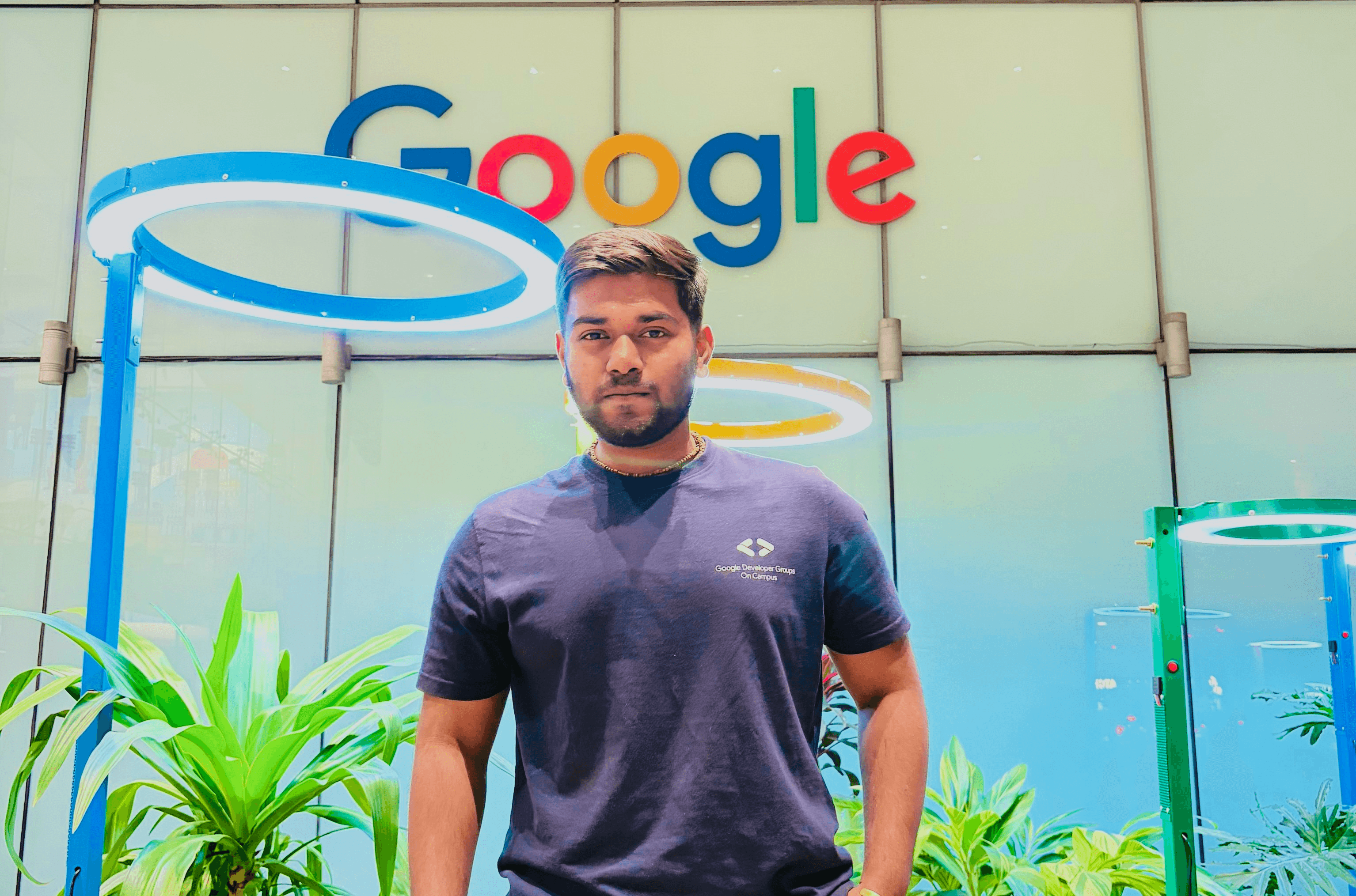 Profile portrait of a man in a grey shirt