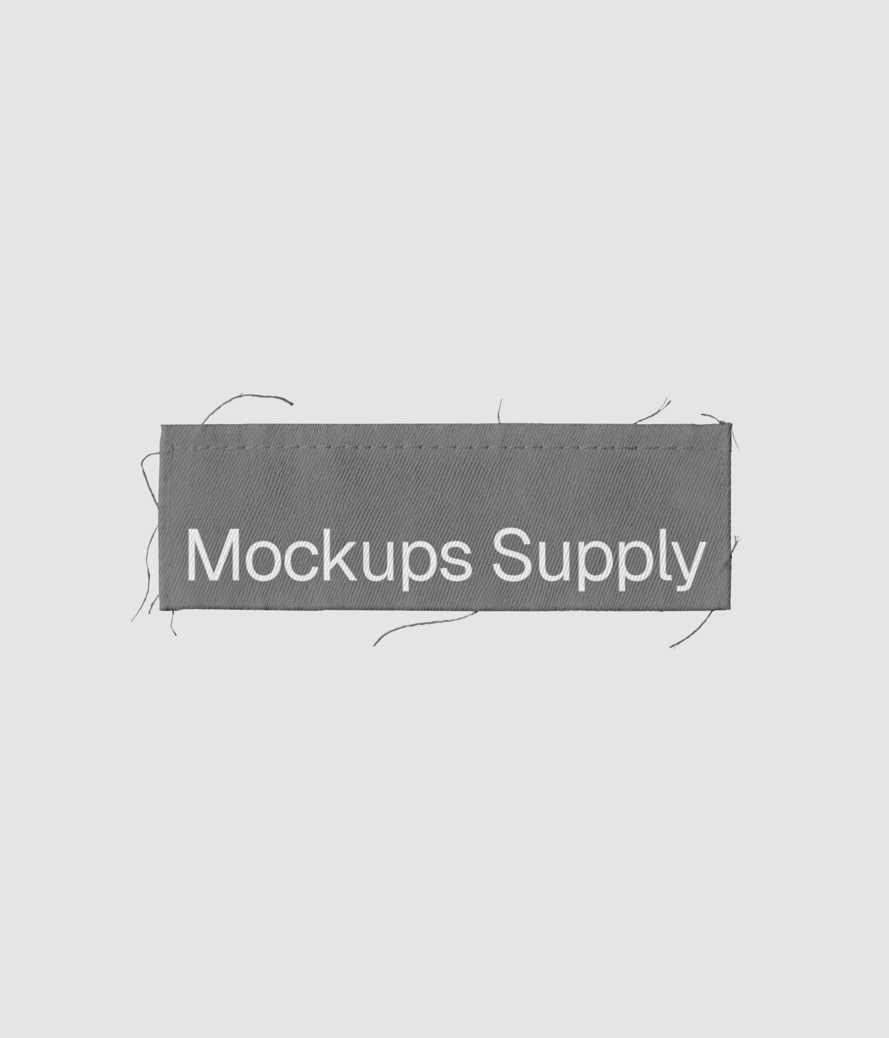 Editable sewn cotton clothing label mockup with loose threads download PSD