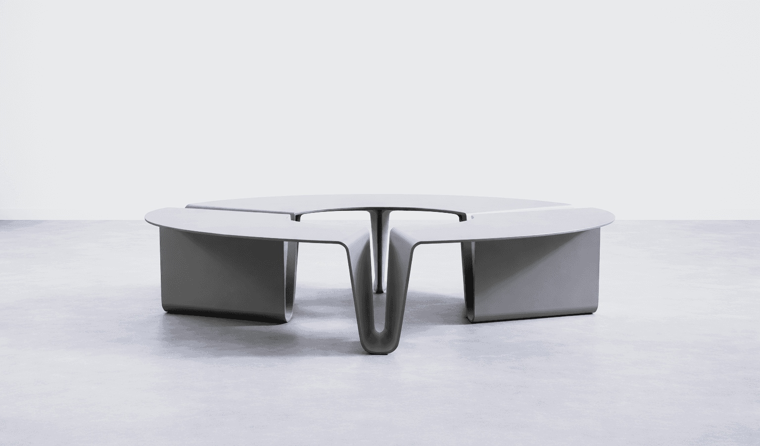 Black and white photo of metalic side table.