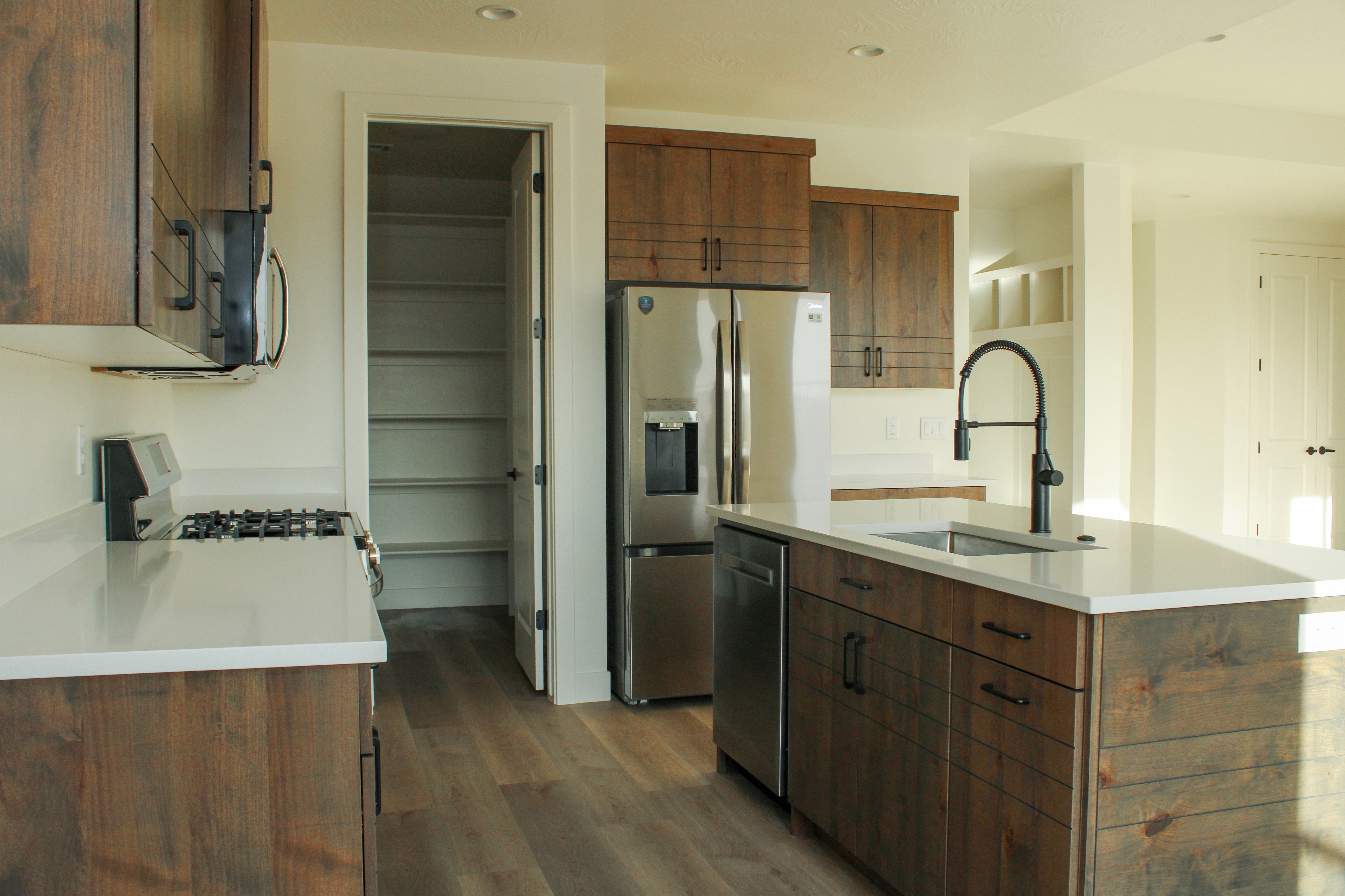 Custom kitchen design in the Golden Hour home in Hurricane, Utah with clean finishes and functional layout.