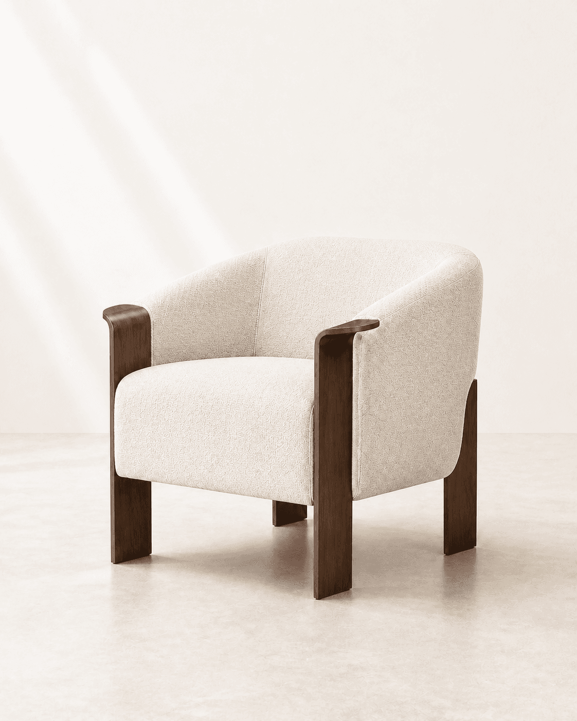 Cinder Armchair, warm-ivory wool upholstery carried by exactly four smoked-walnut blade supports, photographed in a bright white studio