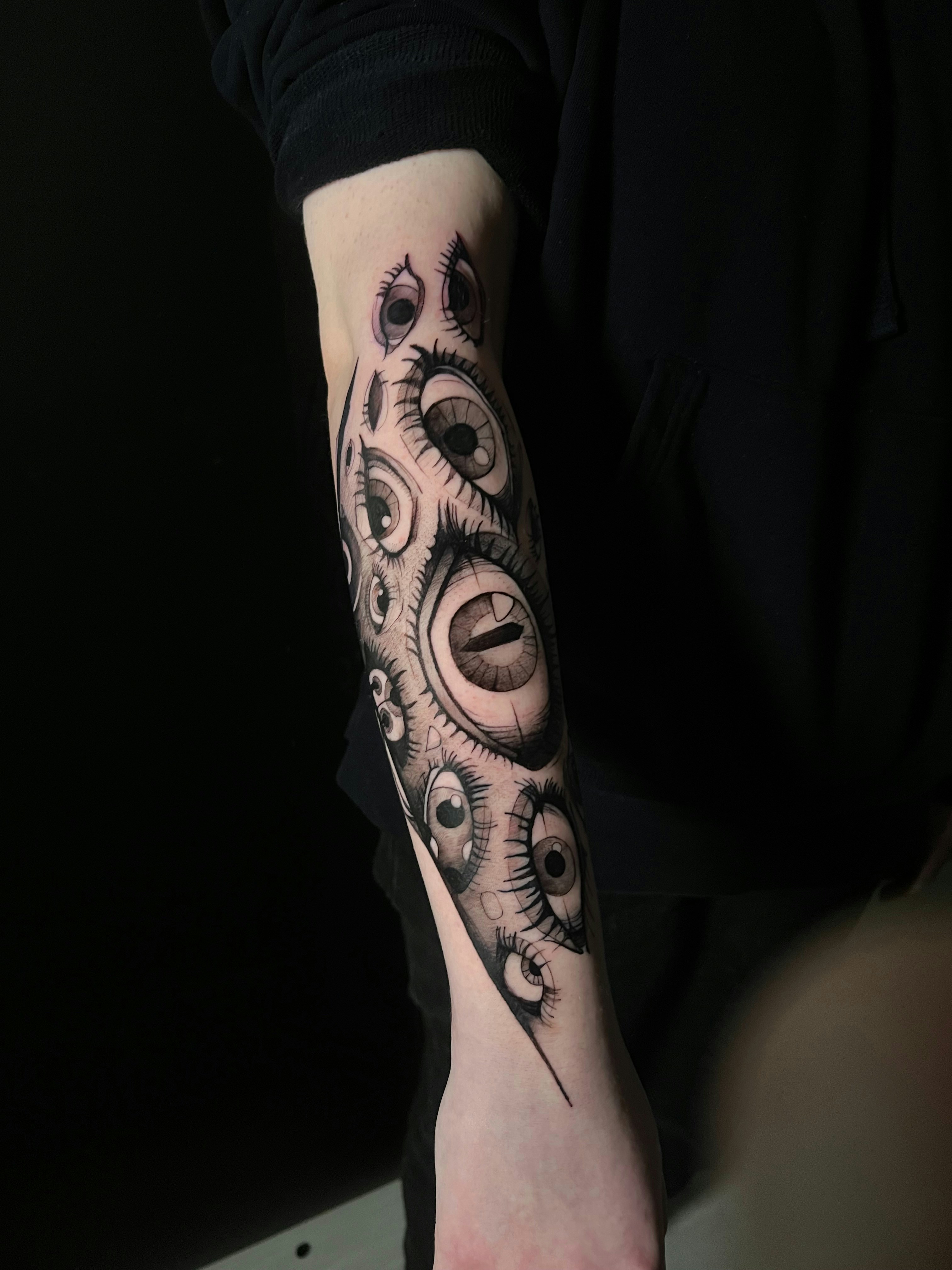 a person with a tattoo on their arm