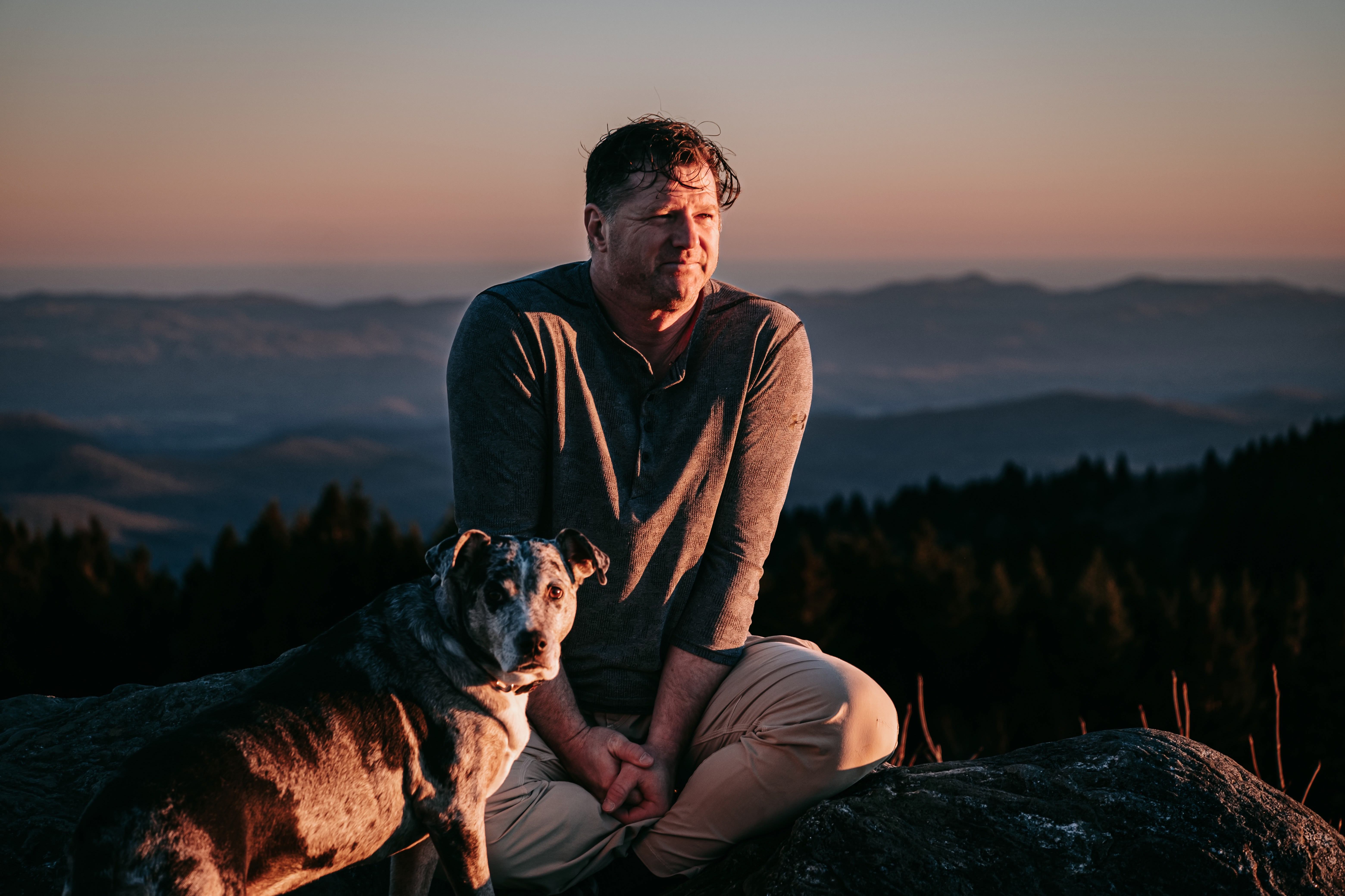people sitting on chair in front of laptop computers