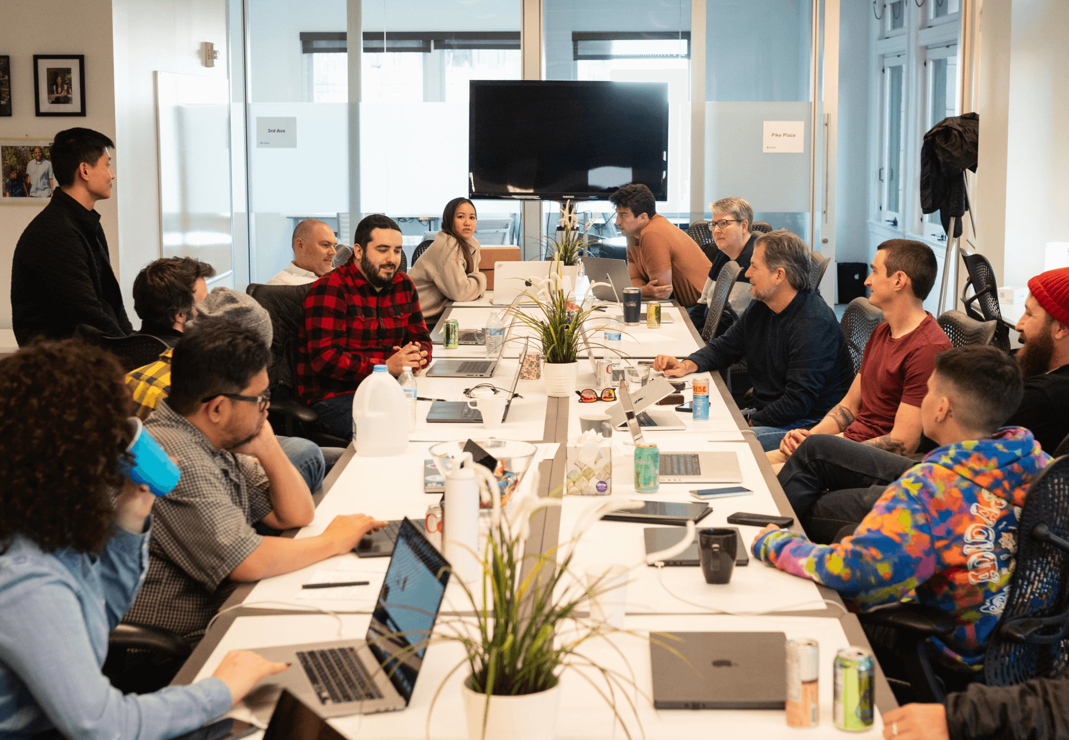 Possible employees at a conference table.