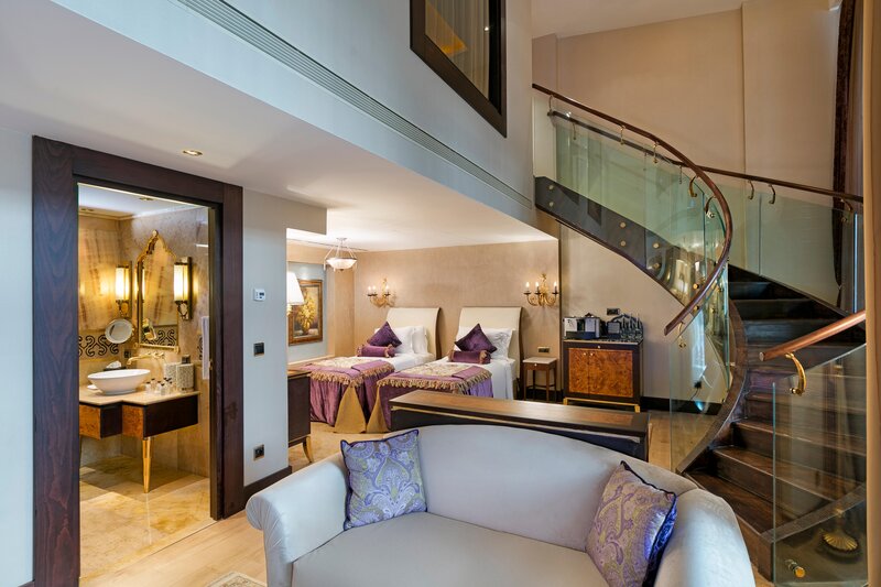 Lower-floor living space opening onto a private terrace with direct pool access.