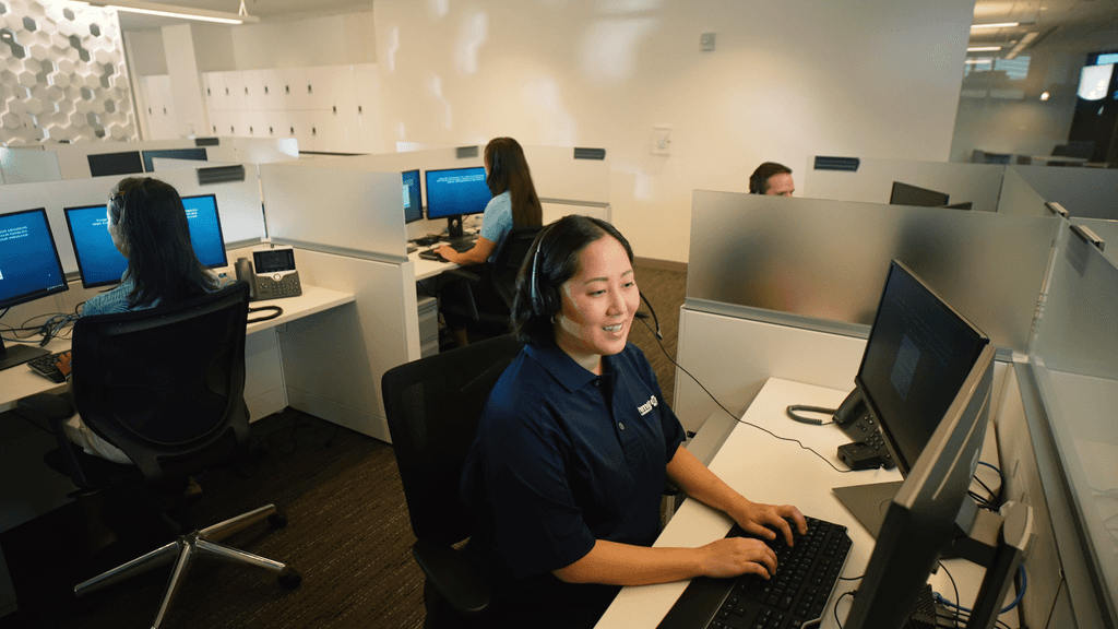 Call center healthcare staff working at computers