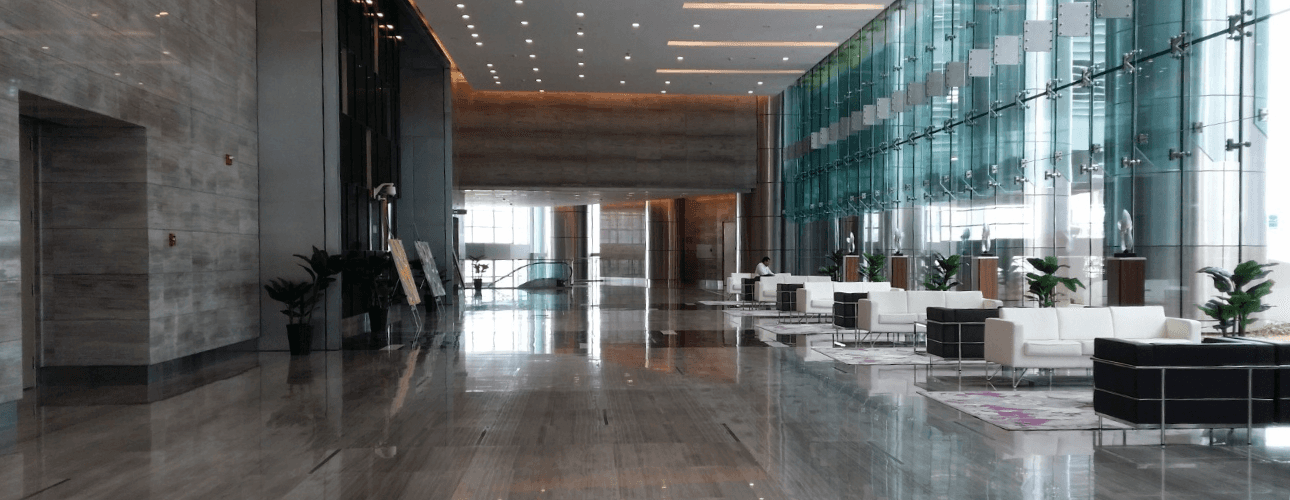 Spacious and elegant lobby of Addax Office Tower, showcasing a professional business environment.