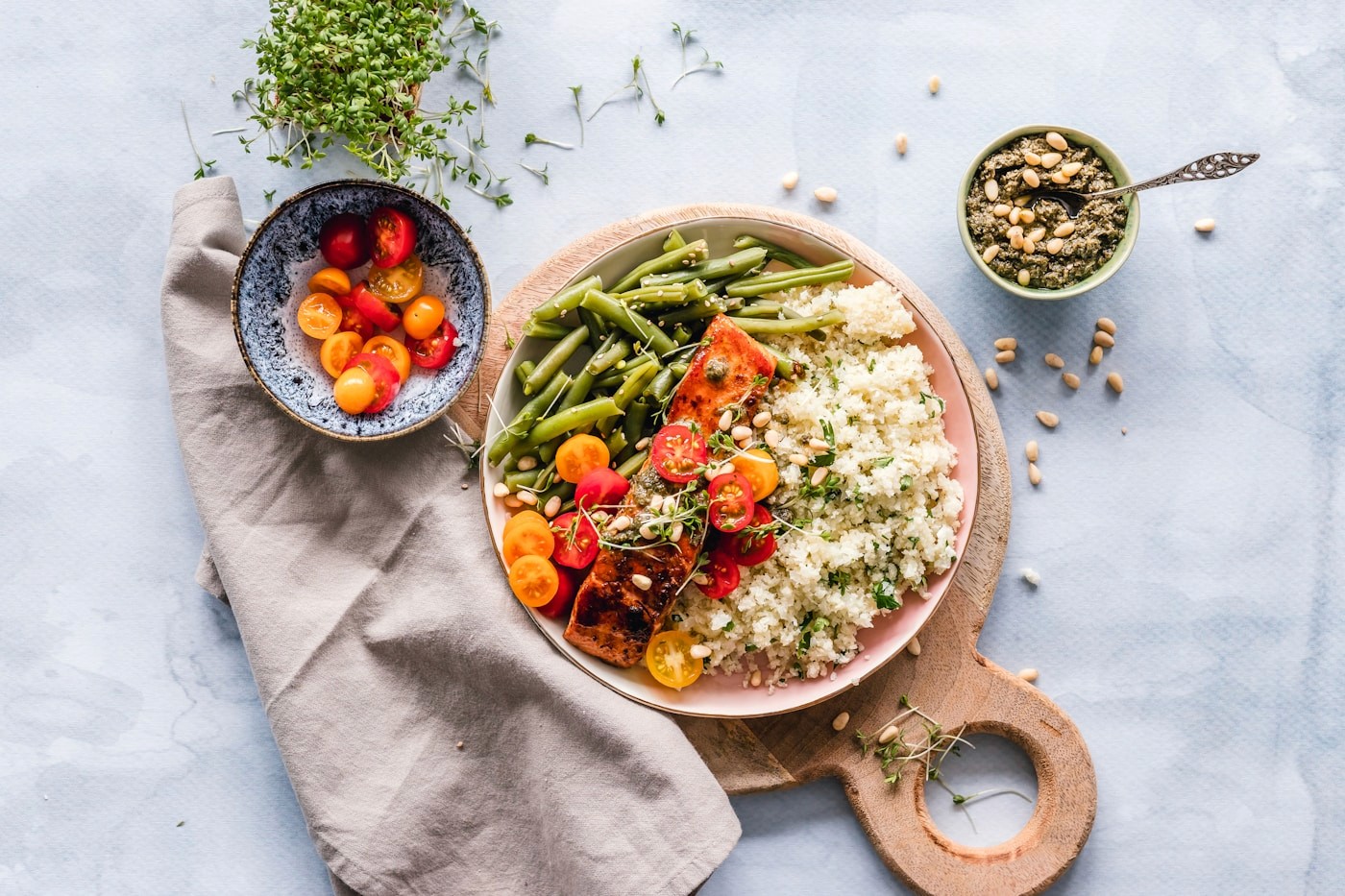 A balanced bowl of grains, roasted vegetables and protein, illustrating carbohydrate-focused fuel