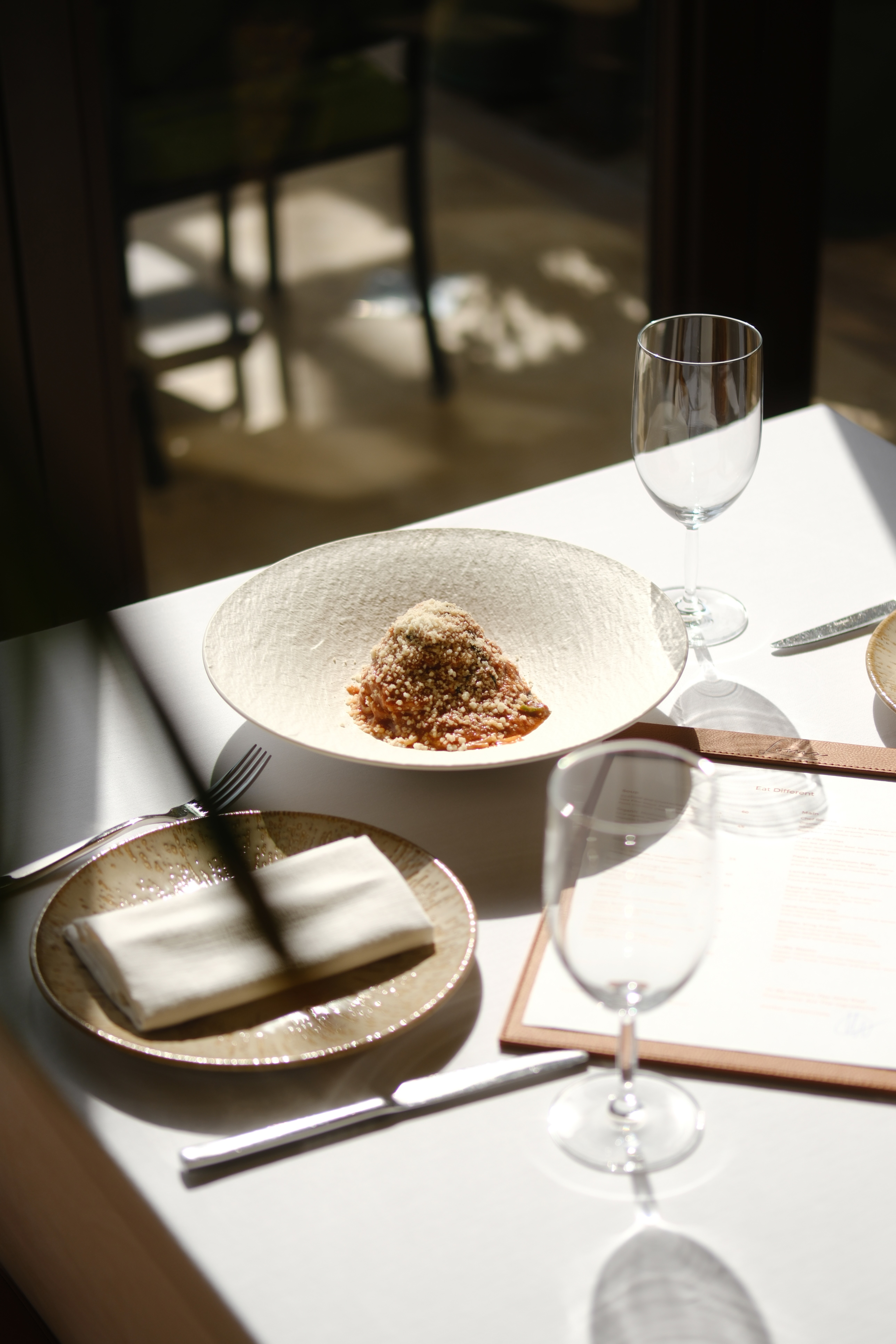 Athlette woman on orange background.