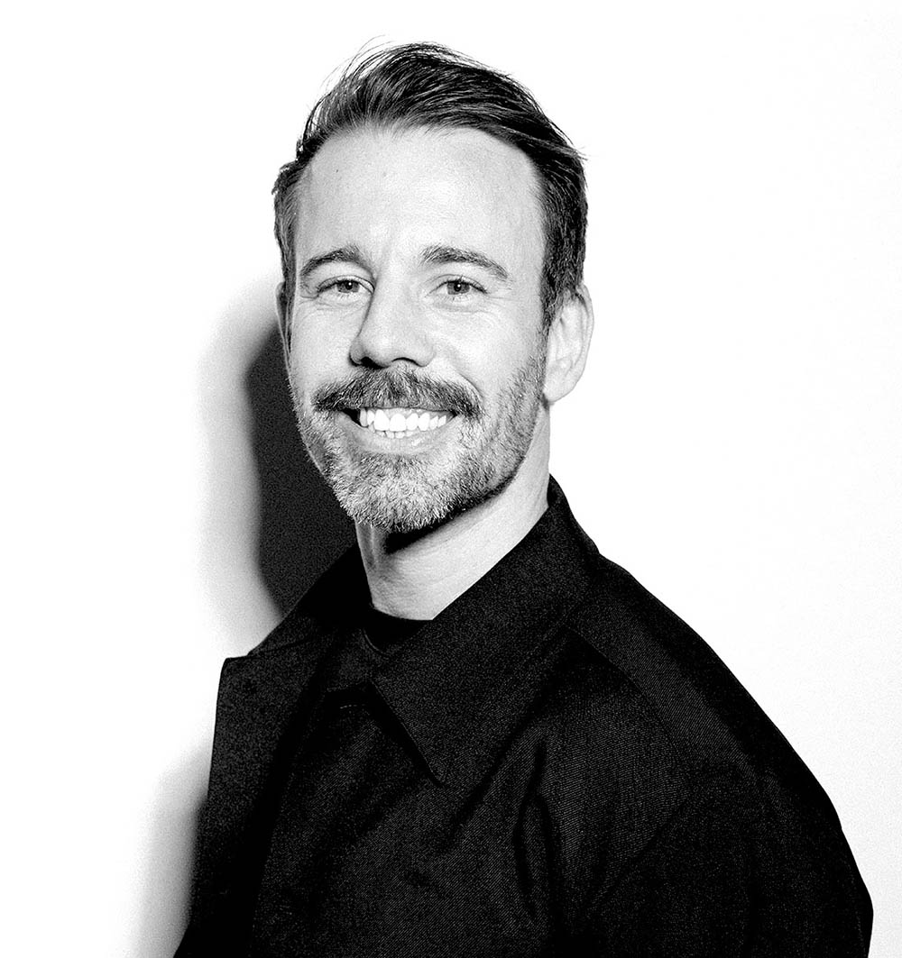 A headshot portrait photo of Jake Siddall Creative Director and founder of Kyttn