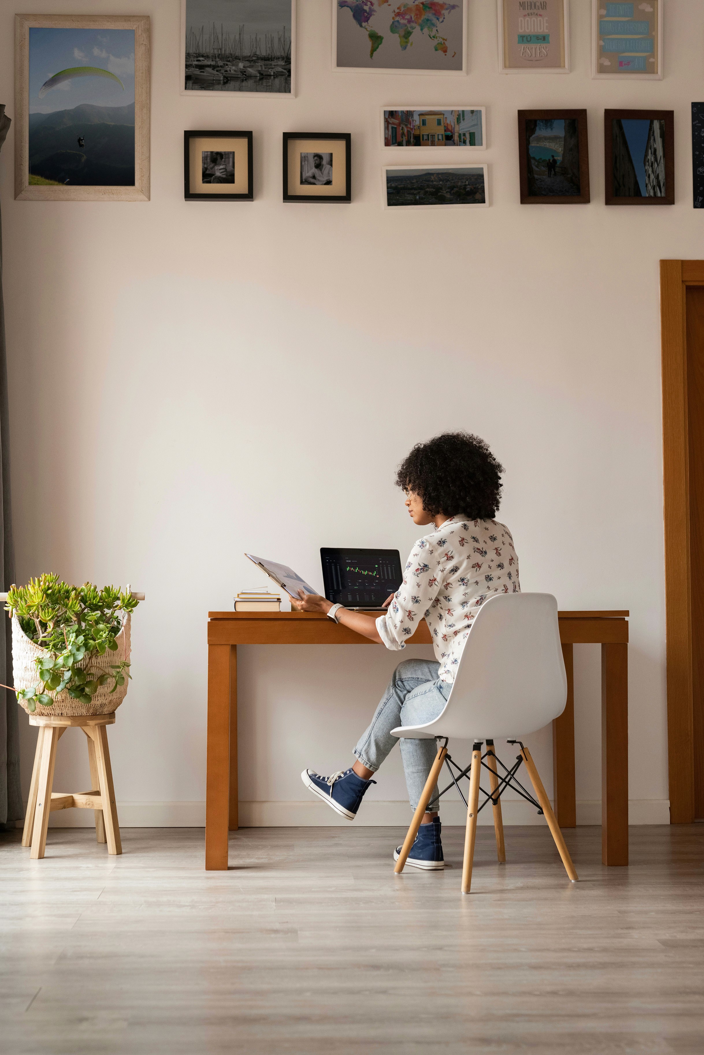 A young woman sat at a desk 