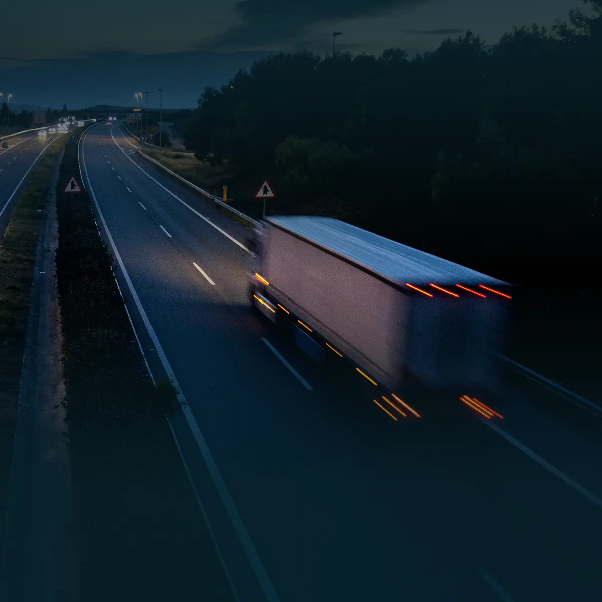 Truck on a highway at dusk