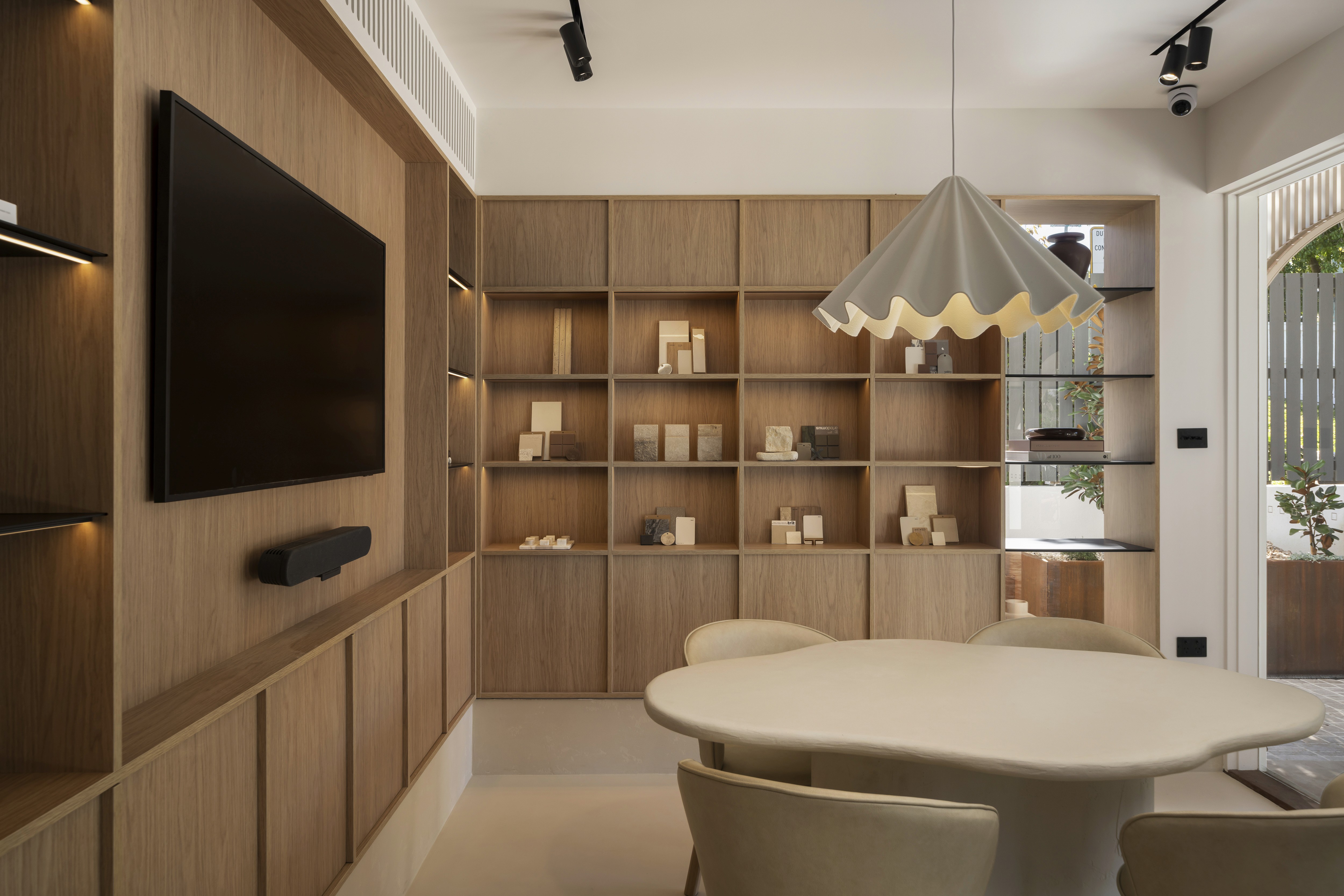 Interior design: timber joinery, shelving and meeting table inside the Stark Builders studio