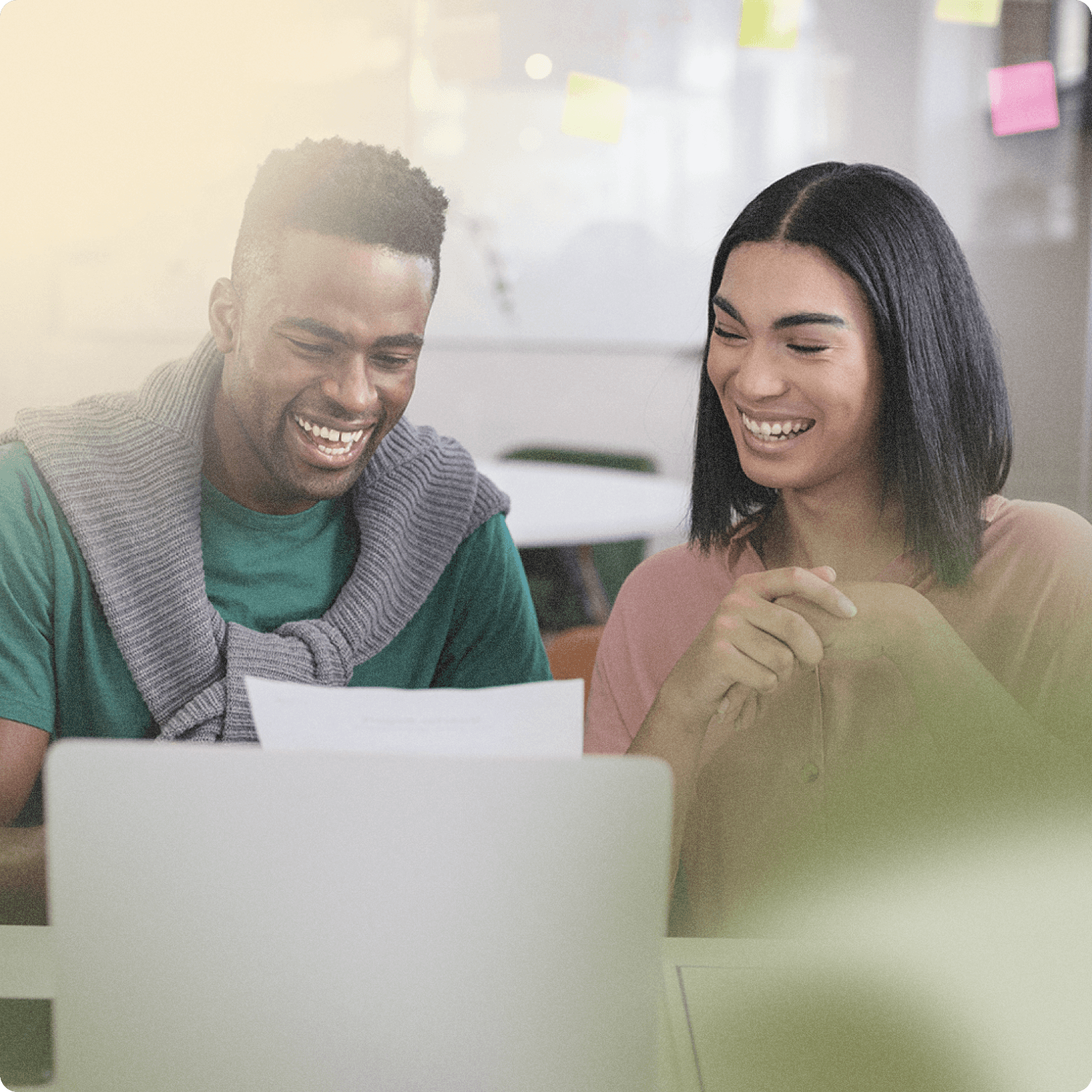 man and women using laptop