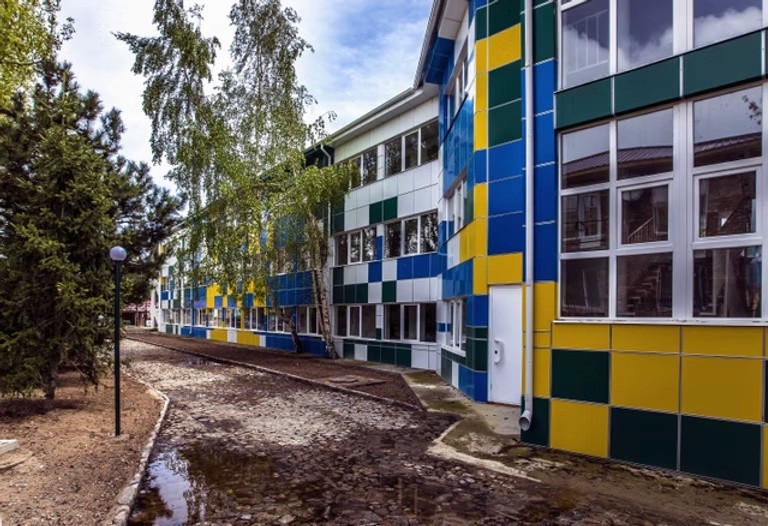 Dazzle Logo with sign vertical