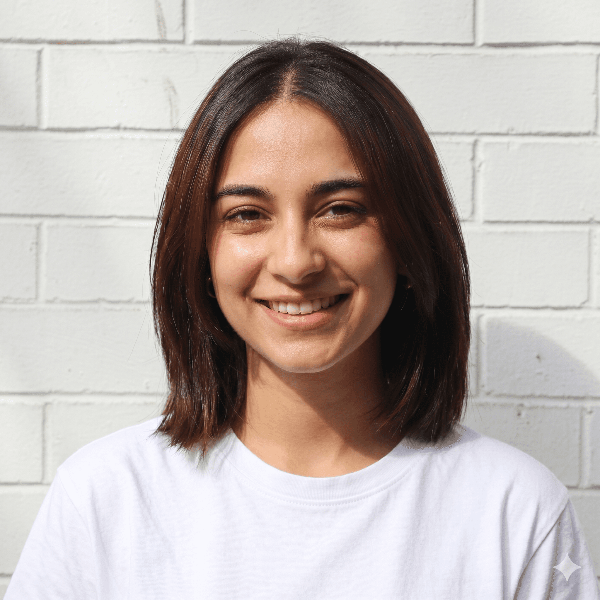 woman in white crew neck shirt smiling
