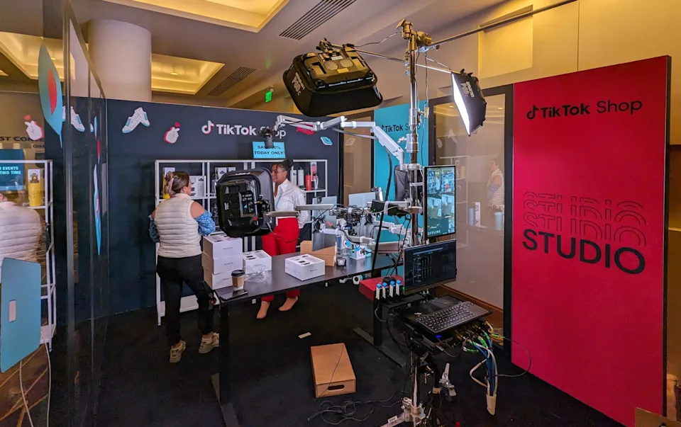 Behind-the-scenes TikTok Shop studio where sellers create branded content and optimized storefront layouts using Shop Design tools.