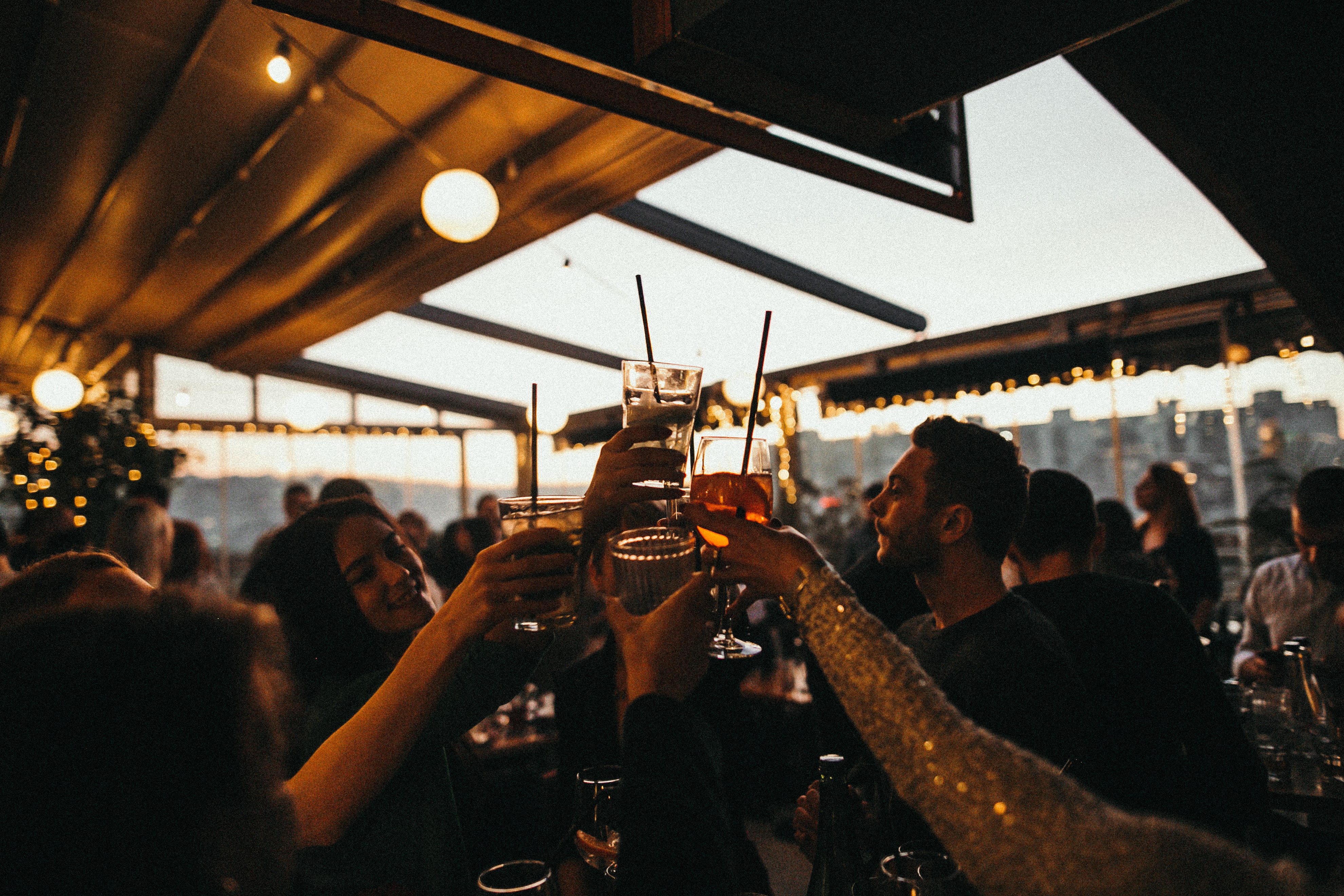 Close up of a cocktail being served at a bar