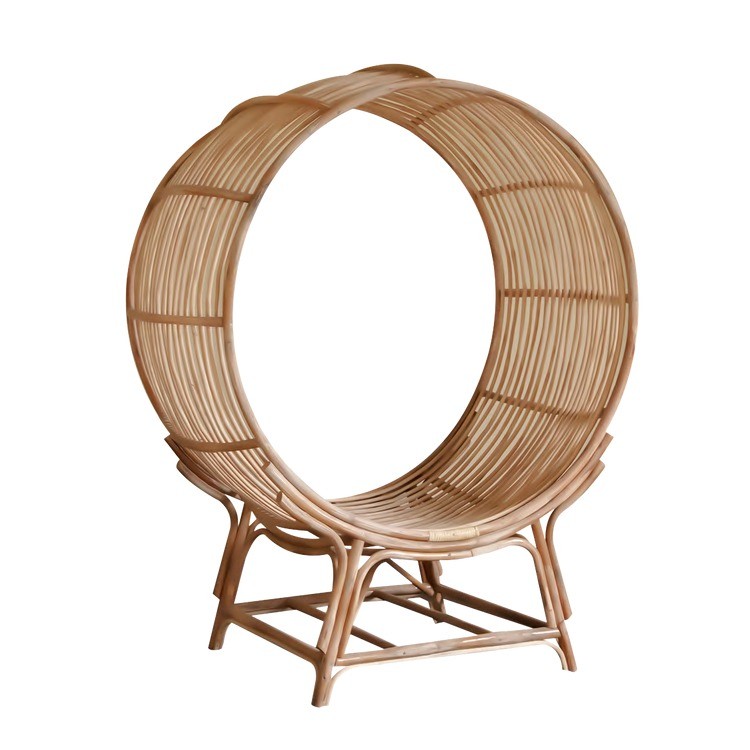 Handcrafted circular cane lounge chair with ring design