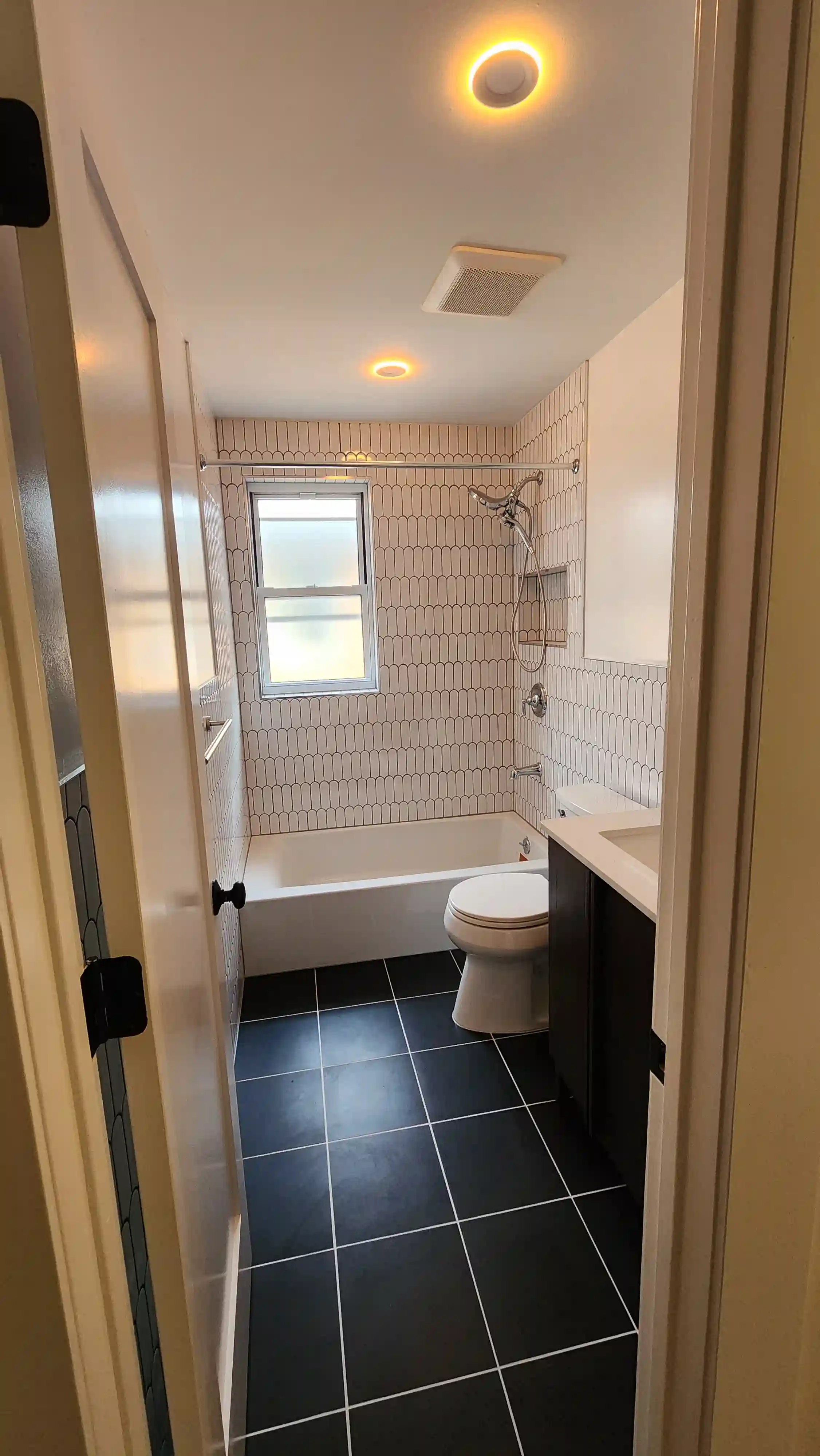 Luxury Trex composite deck stairs with picture framing, recessed lighting, and Transcend railings in Queens, NYC