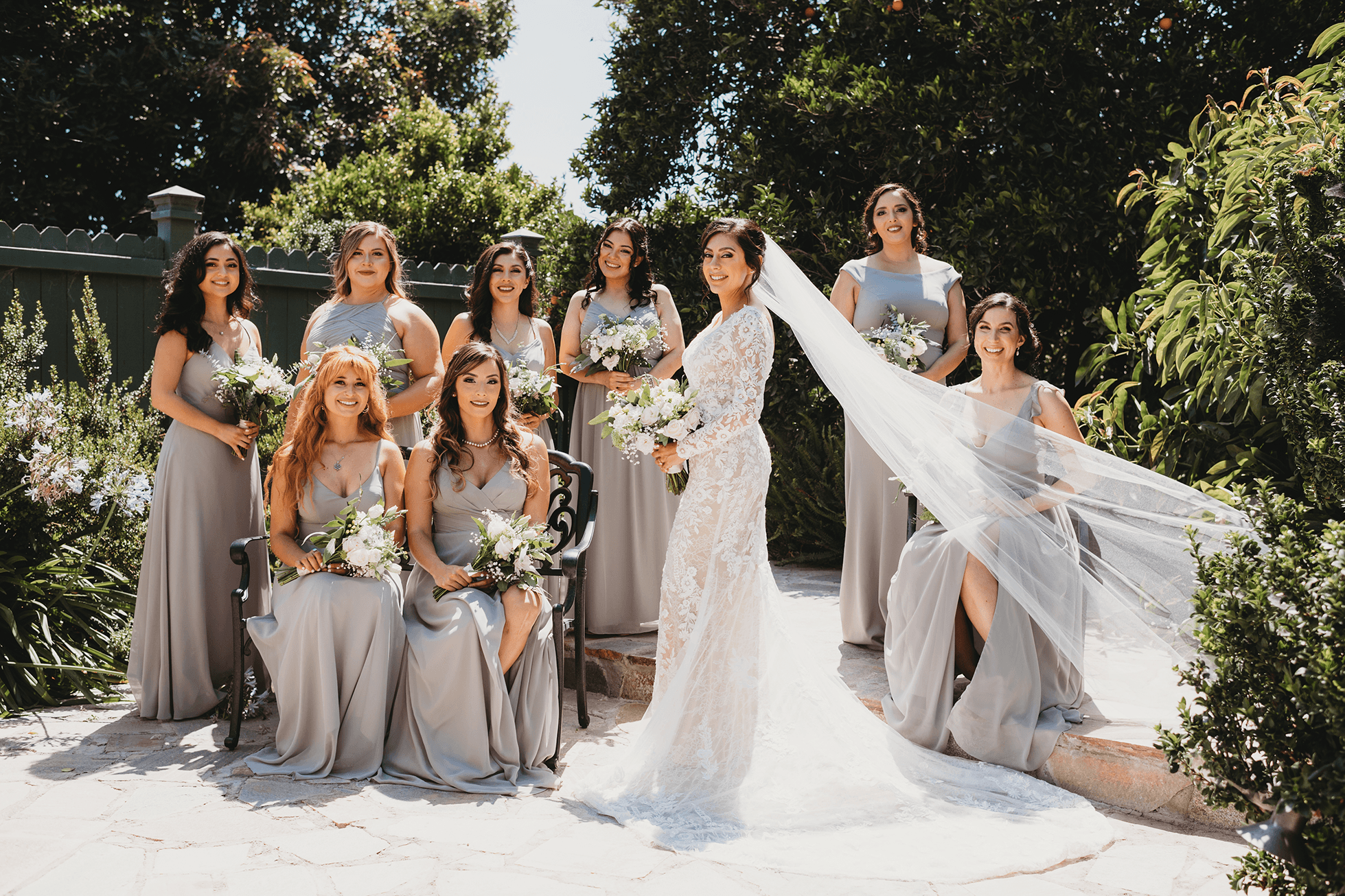 Flat lay wedding details with bouquet, rings, and sparkling bridal heels