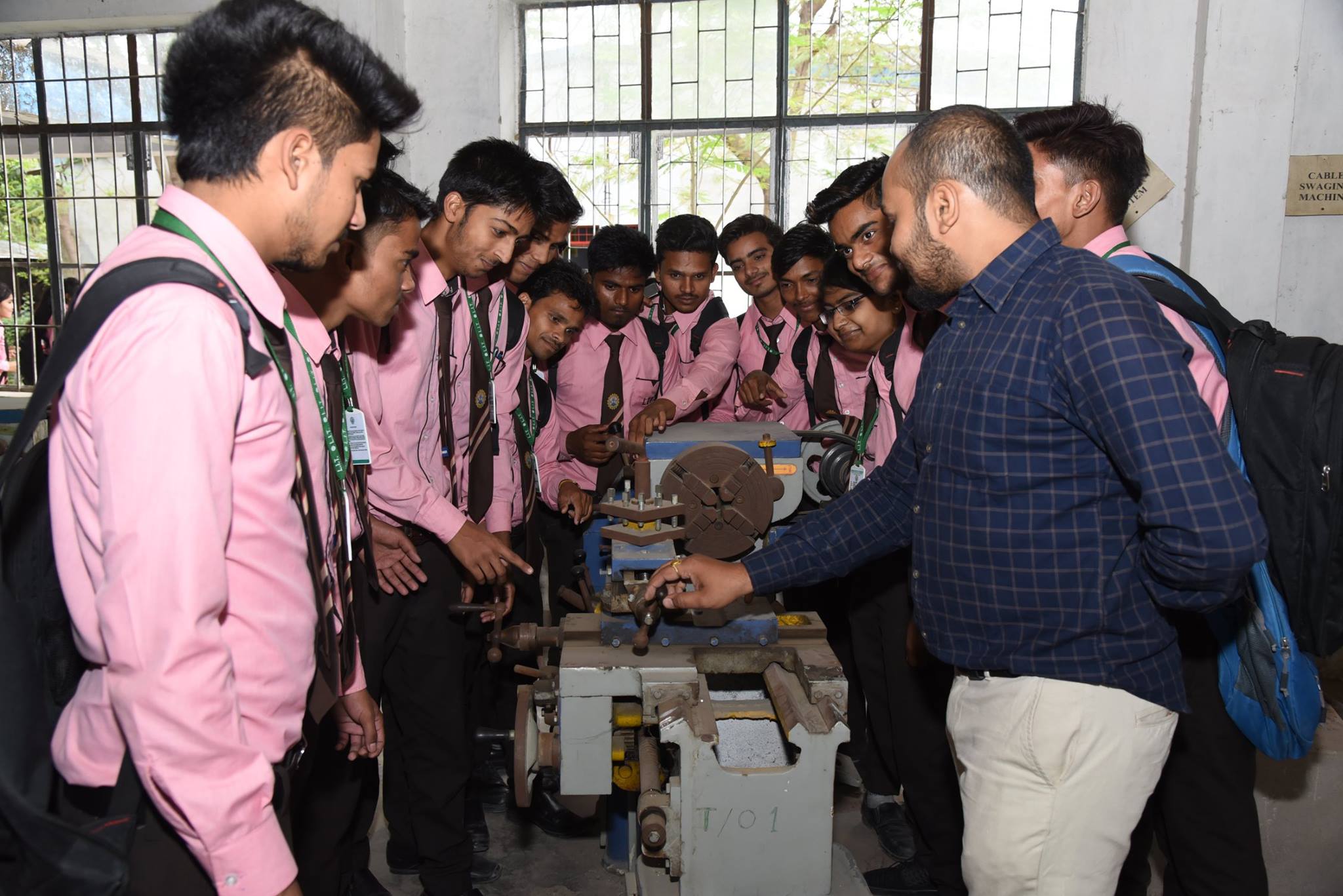 Full moon rising behind a house at night