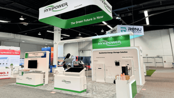 20x30 RE+ Southeast booth overview with technical explanation zones, branded presentation surfaces, and organized buyer movement