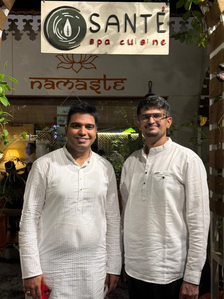 Handpan Echoes artists posing outside Santé Spa Cuisine Pune after a live ambient music performance