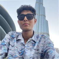 man wearing black and white top
