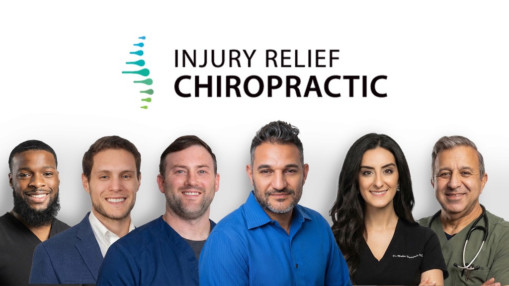Chiropractor adjusting patient's upper back and neck.