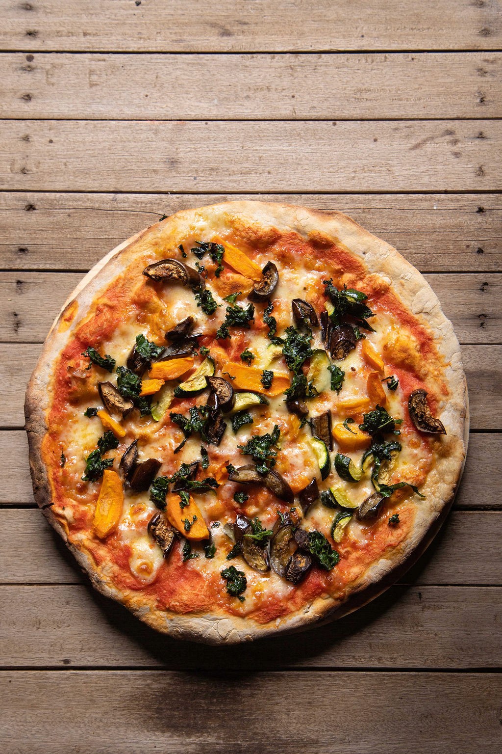 Thin crust pizza with courgette, sweet potato, fig and spinach