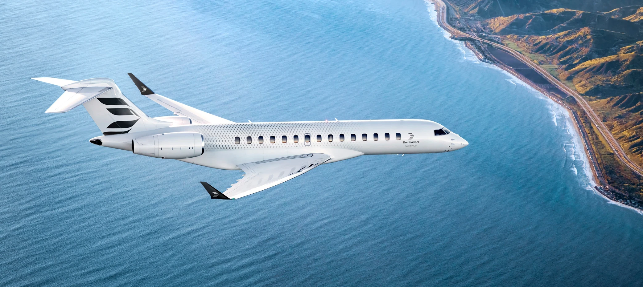 Bombardier Global 8000 above the coastline.