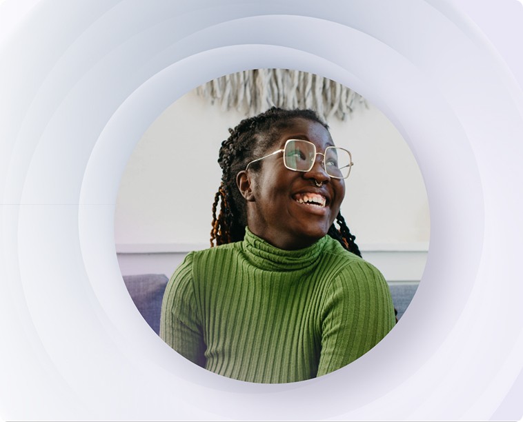 Headshot of a smiling person in a graphic frame