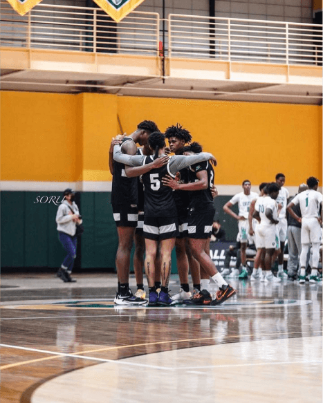 Elite gap year basketball schools Team huddle