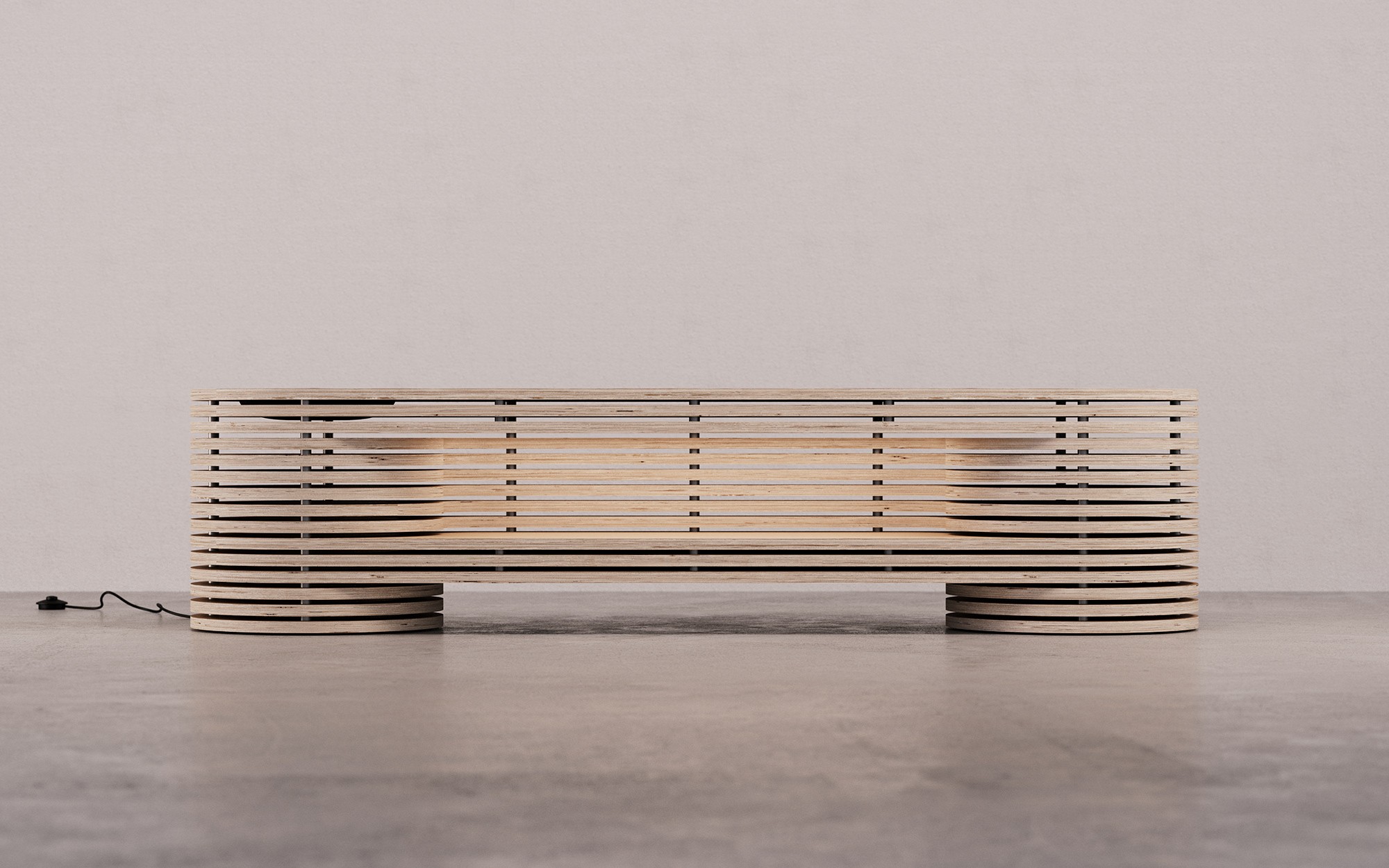 CNC-milled plywood bench built from repeated layered slices viewed from the front