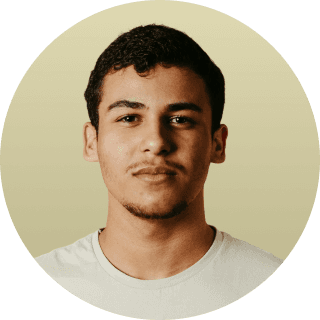 woman in white crew neck shirt smiling