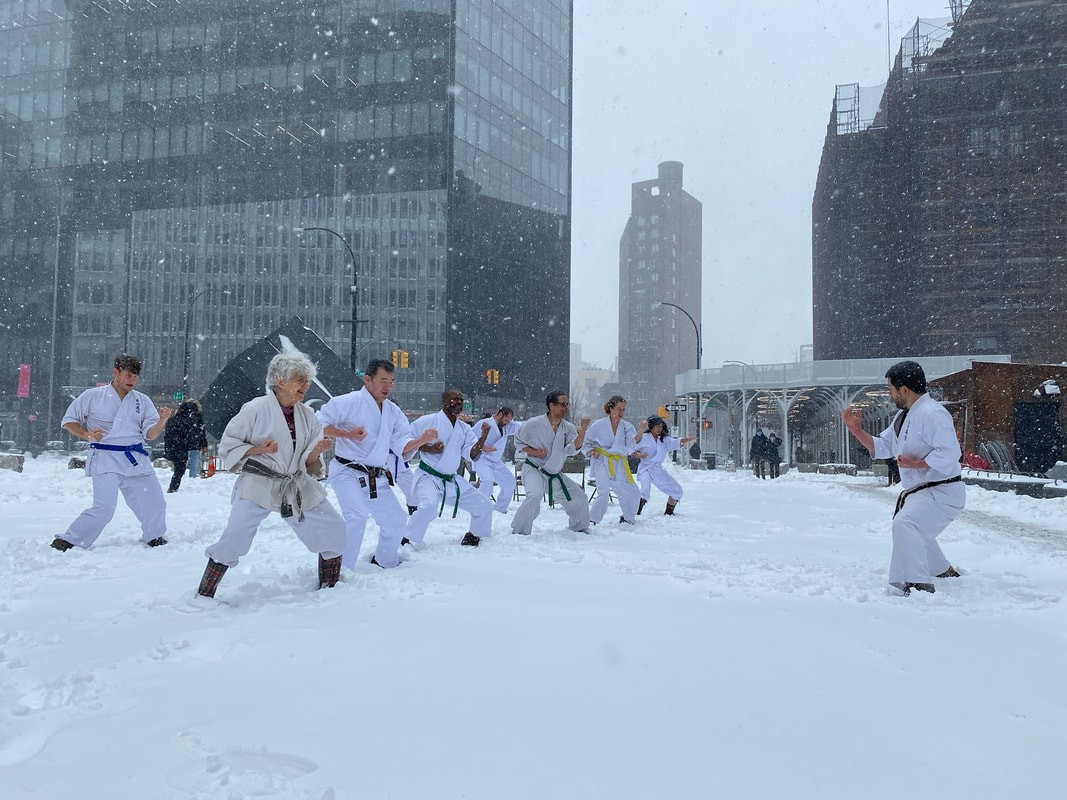 Drone shot of a running track at night