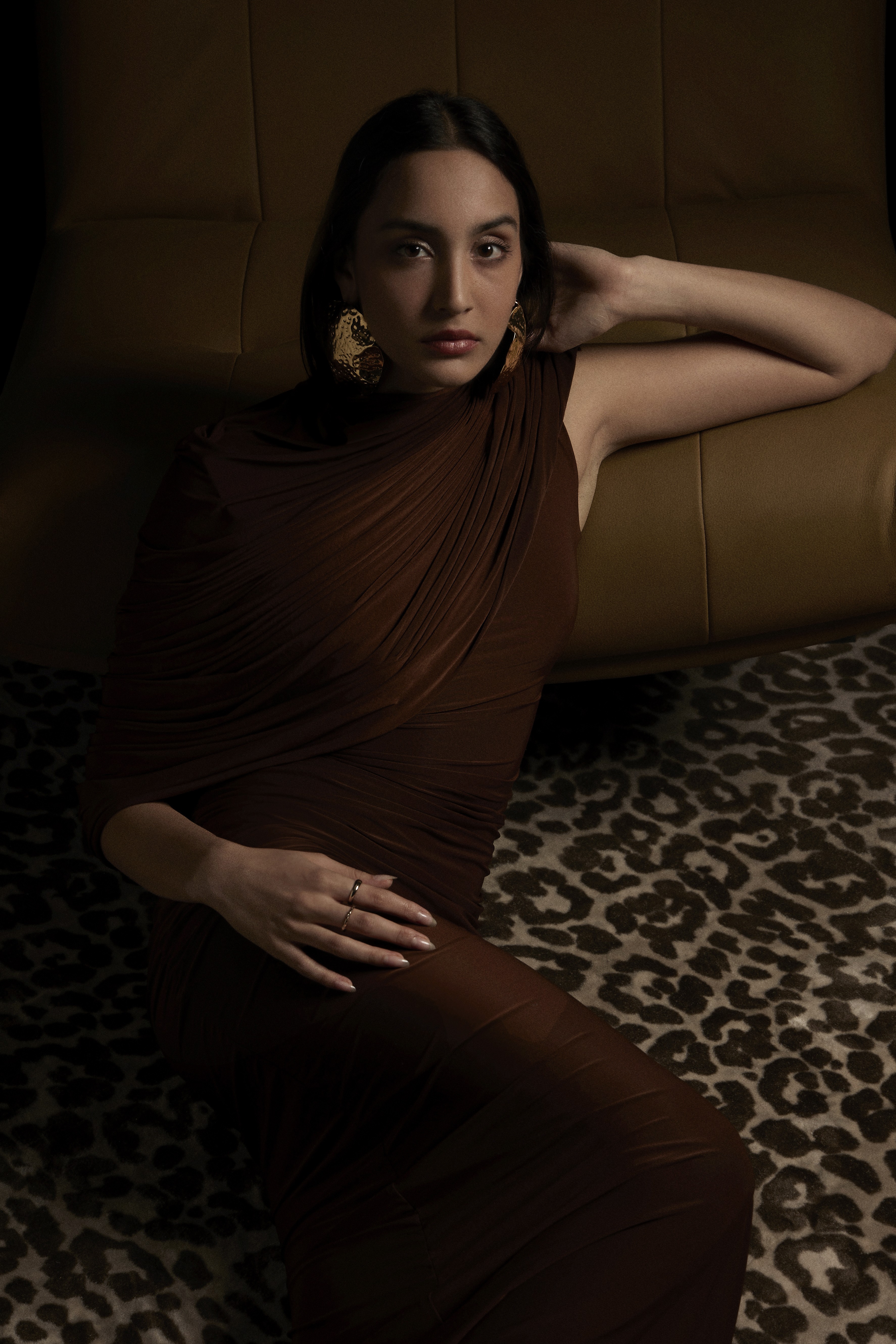 Friends laughing and posing inside a car