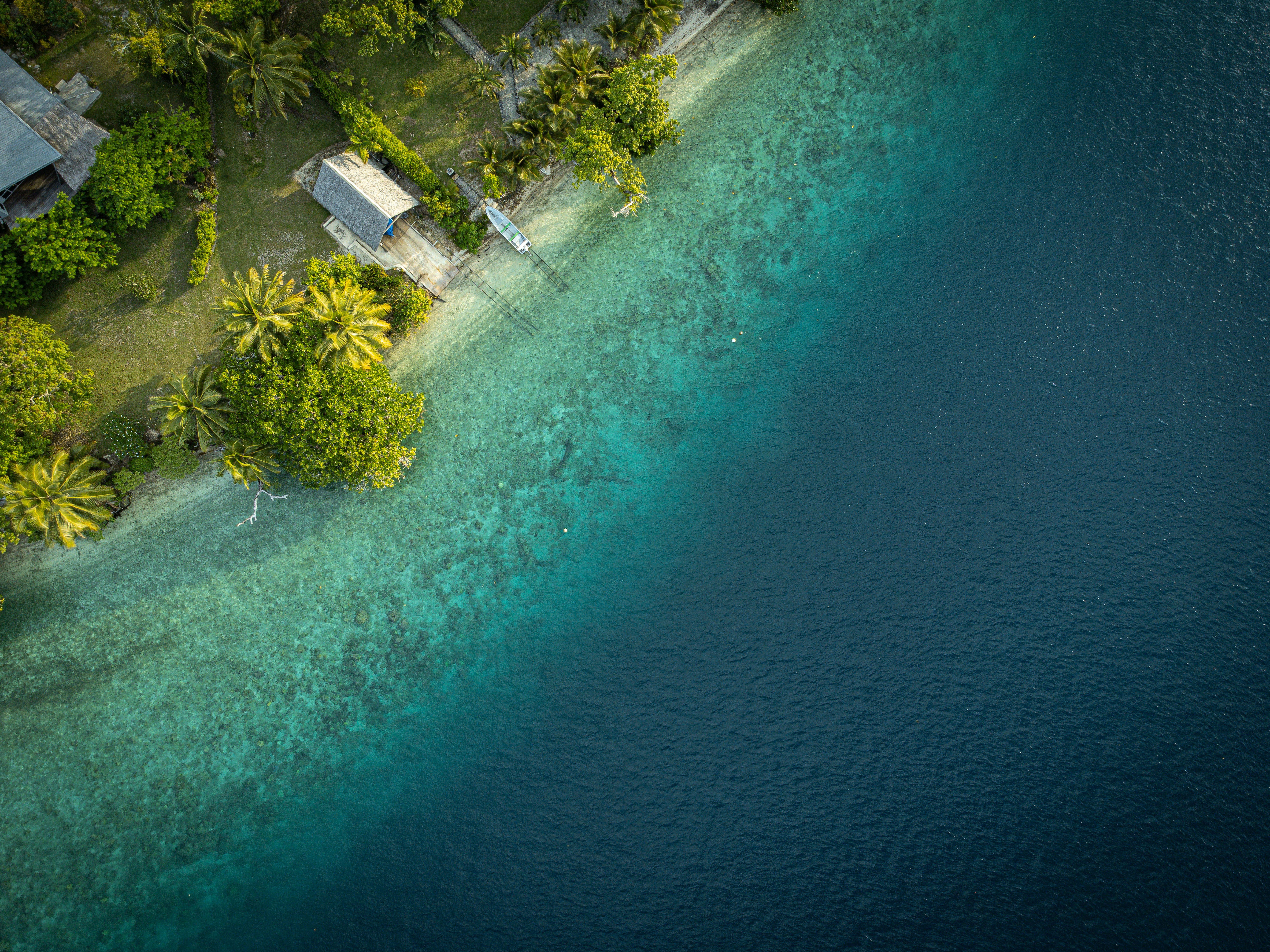 Aerial view of a tropical coastline representing Anguilla