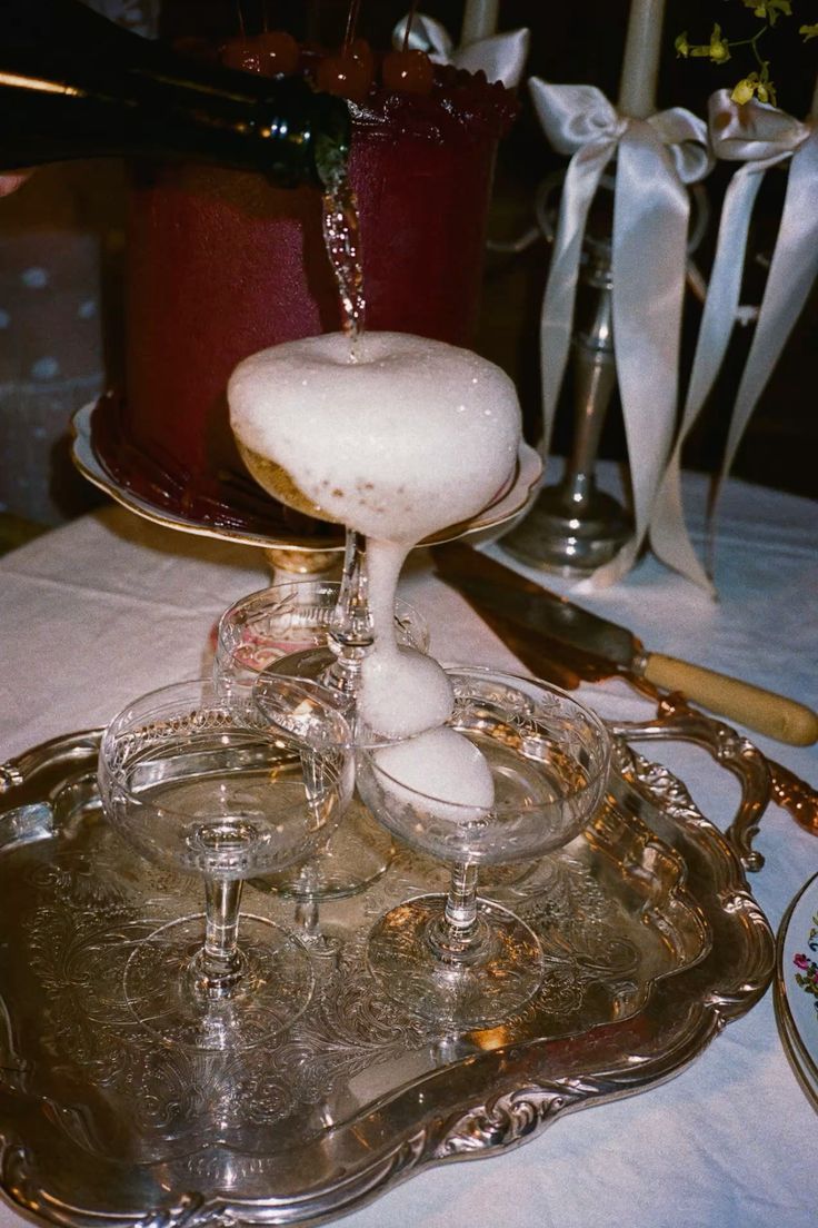 Glass coupe being served at a party